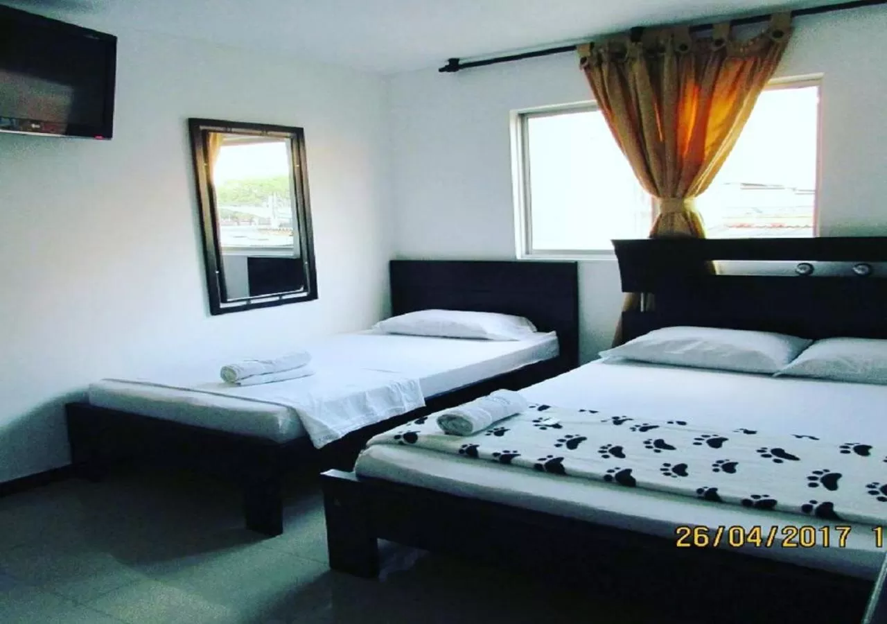 Bed in Hotel Palmeras De Mariana