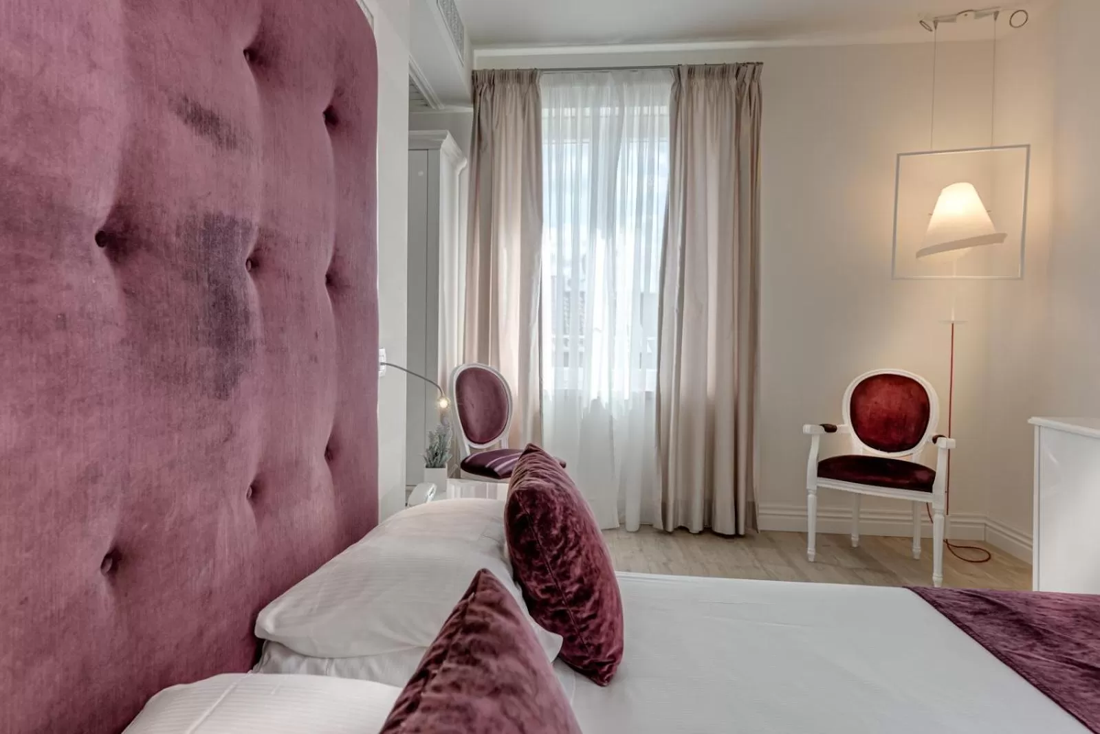 Bed in VILLA LIBERTY Boutique Hotel - Borgo Capitano Collection