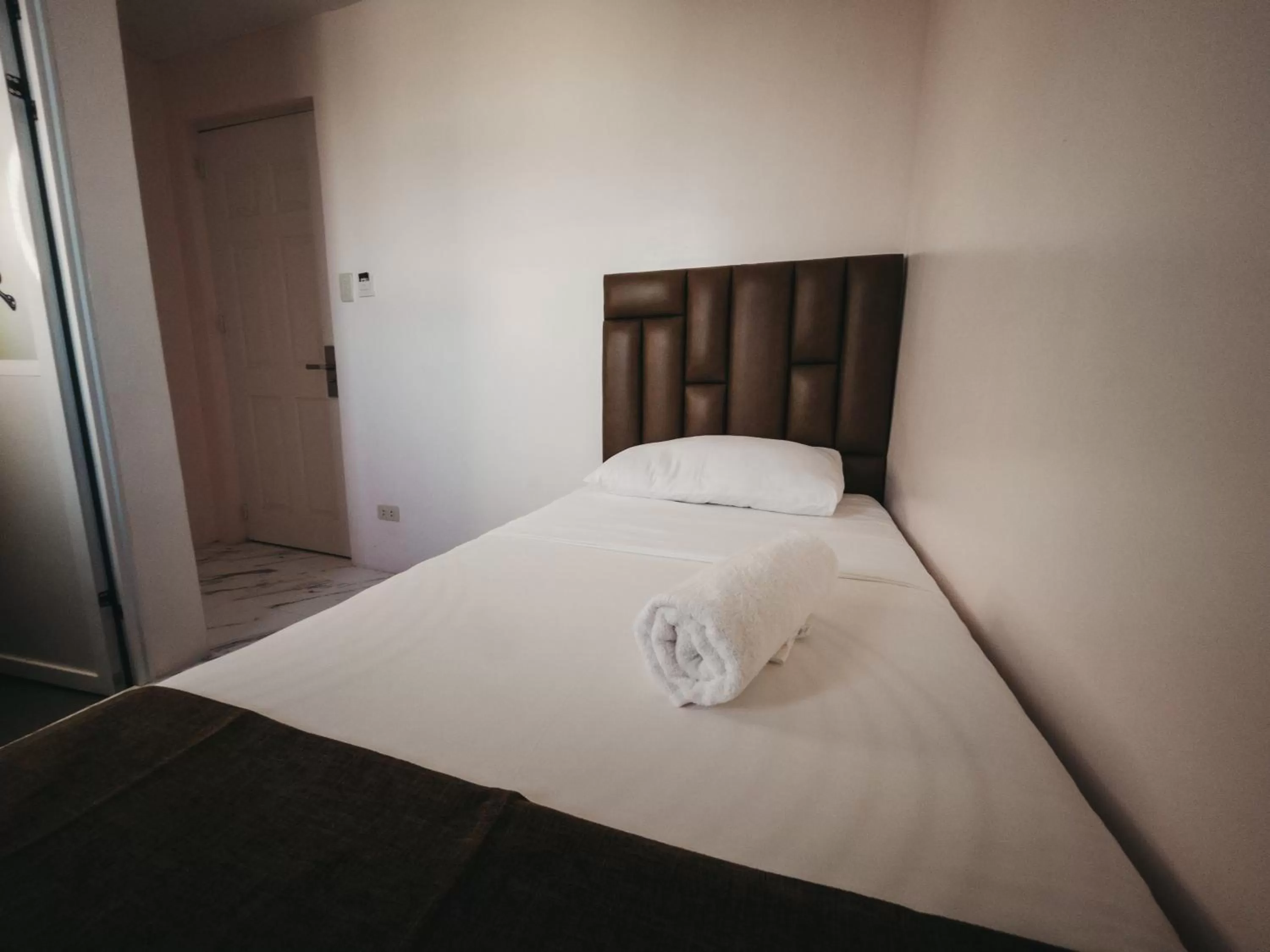 Bed in La Choeben Suites