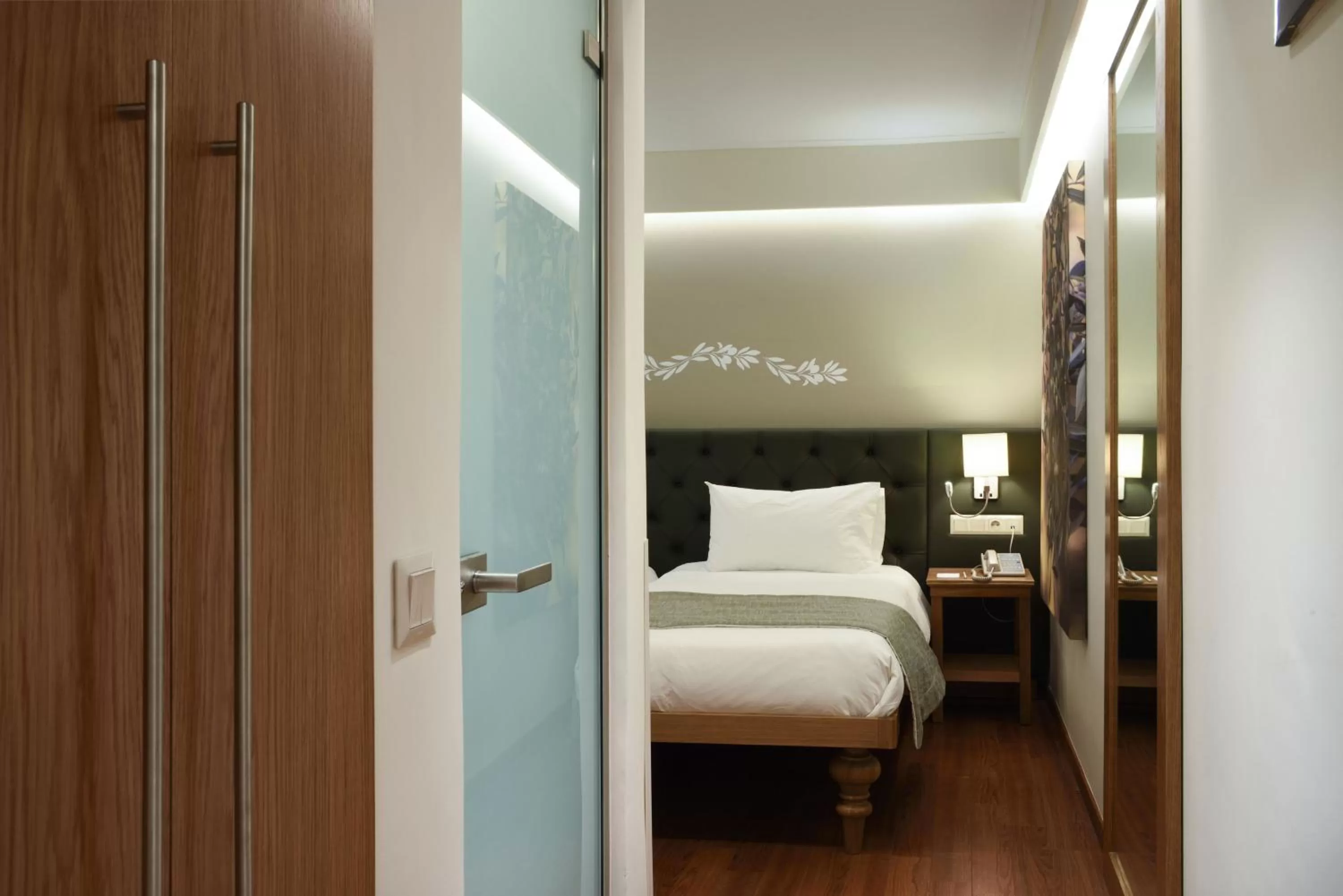 Bed in Titania Hotel