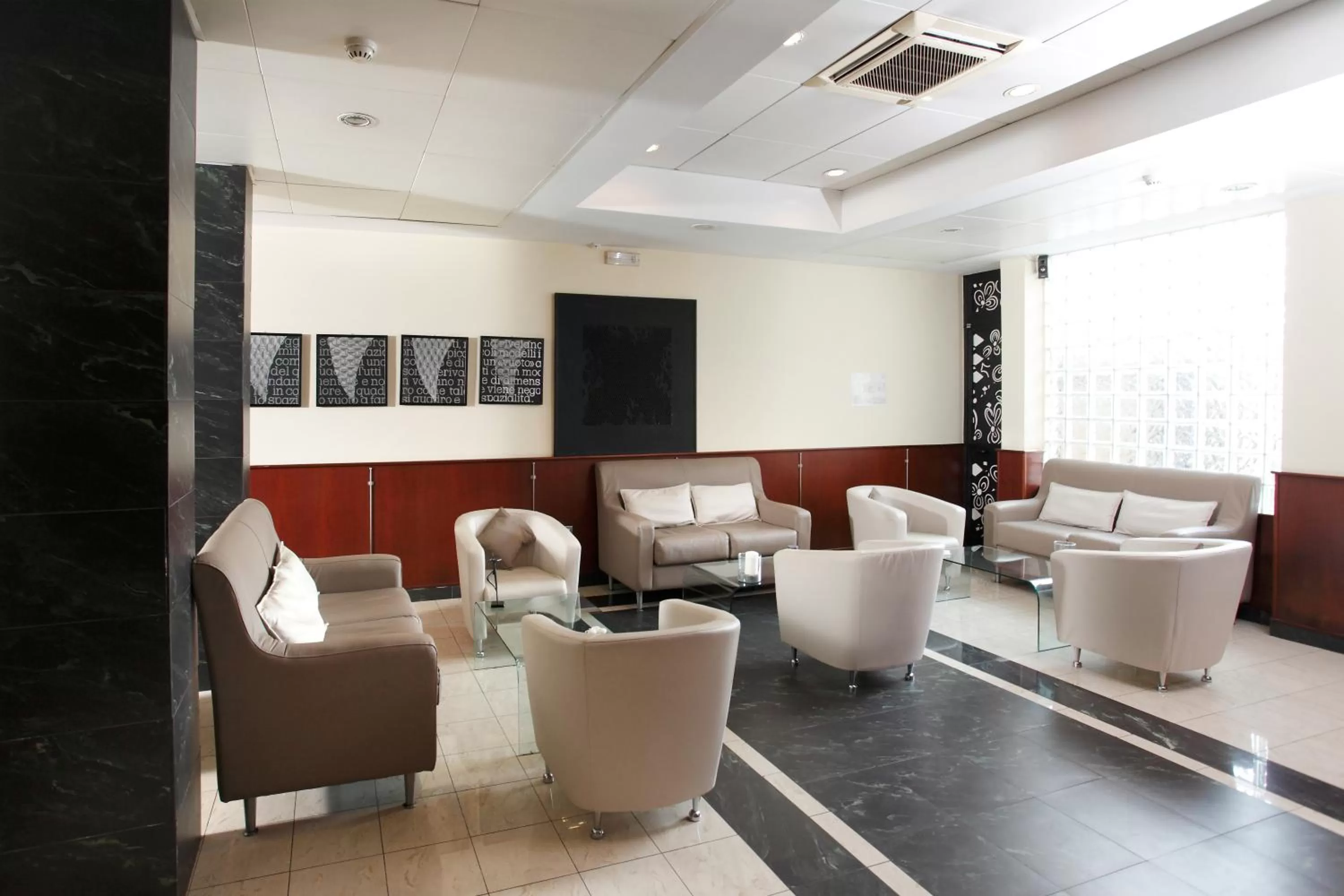 Communal lounge/ TV room in Millennium Gold Hotel