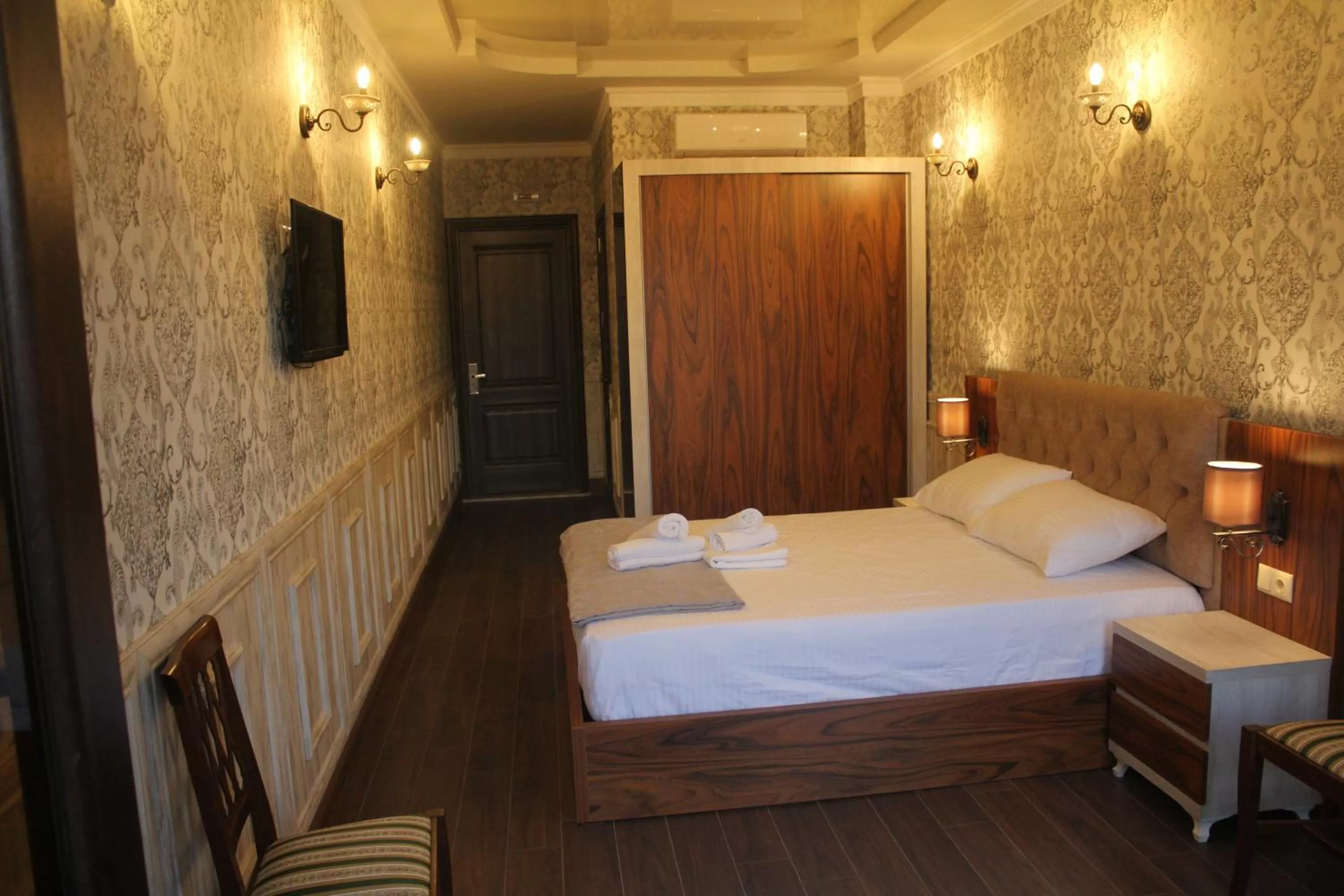 Bed in MELINI Boutique Hotel