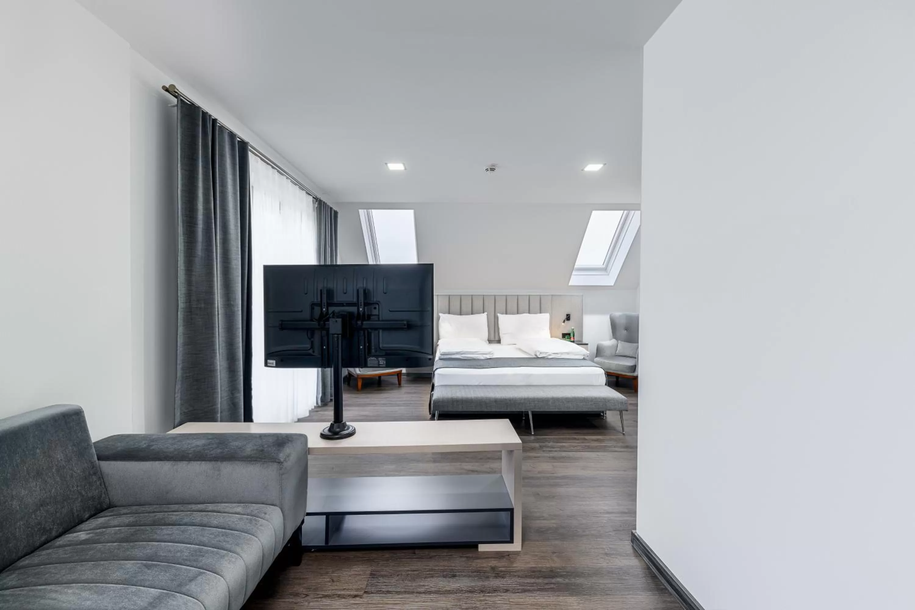 Bed in PARKHOTEL BRAUNAU - 24 Stunden Self Check-IN