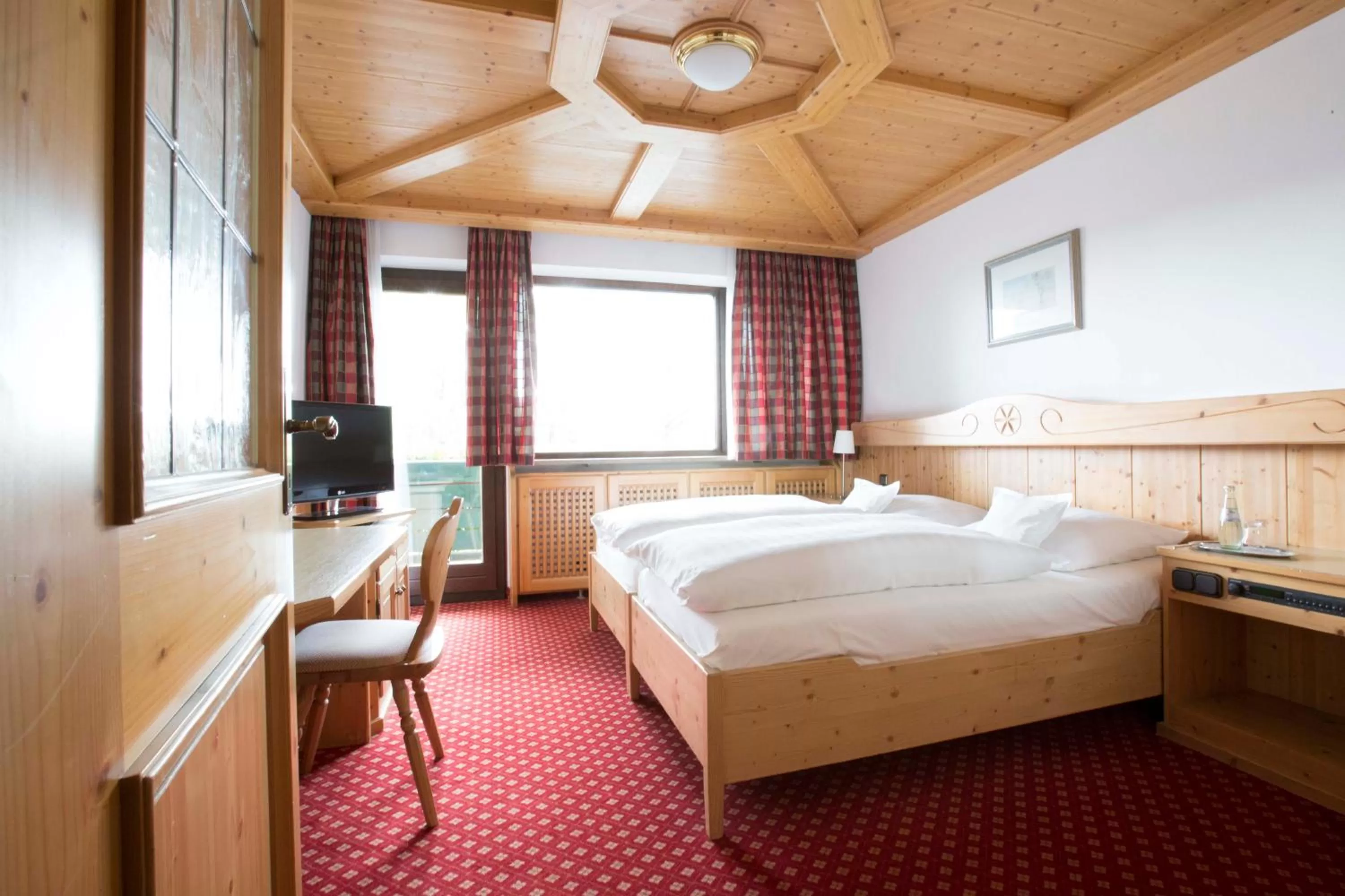 Photo of the whole room, Bed in Hotel Neuwirt