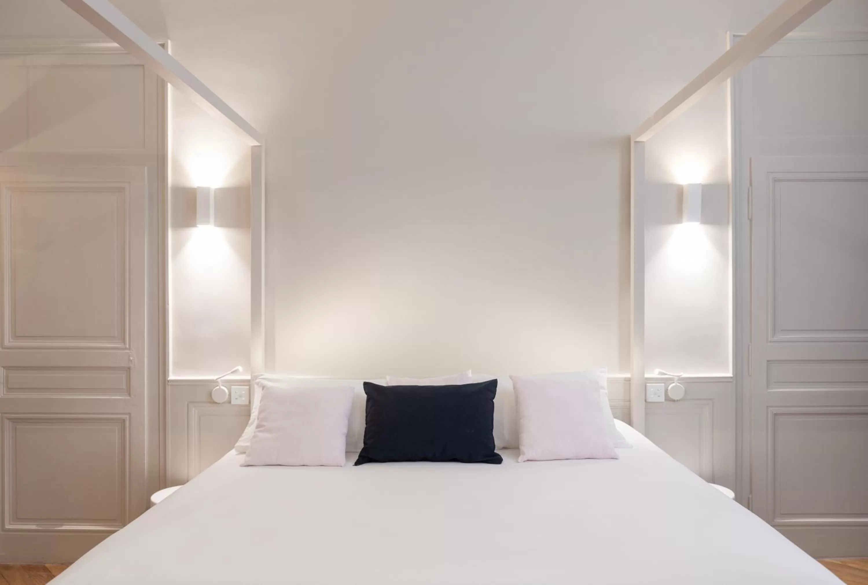 Bed in MiHotel Bizolon