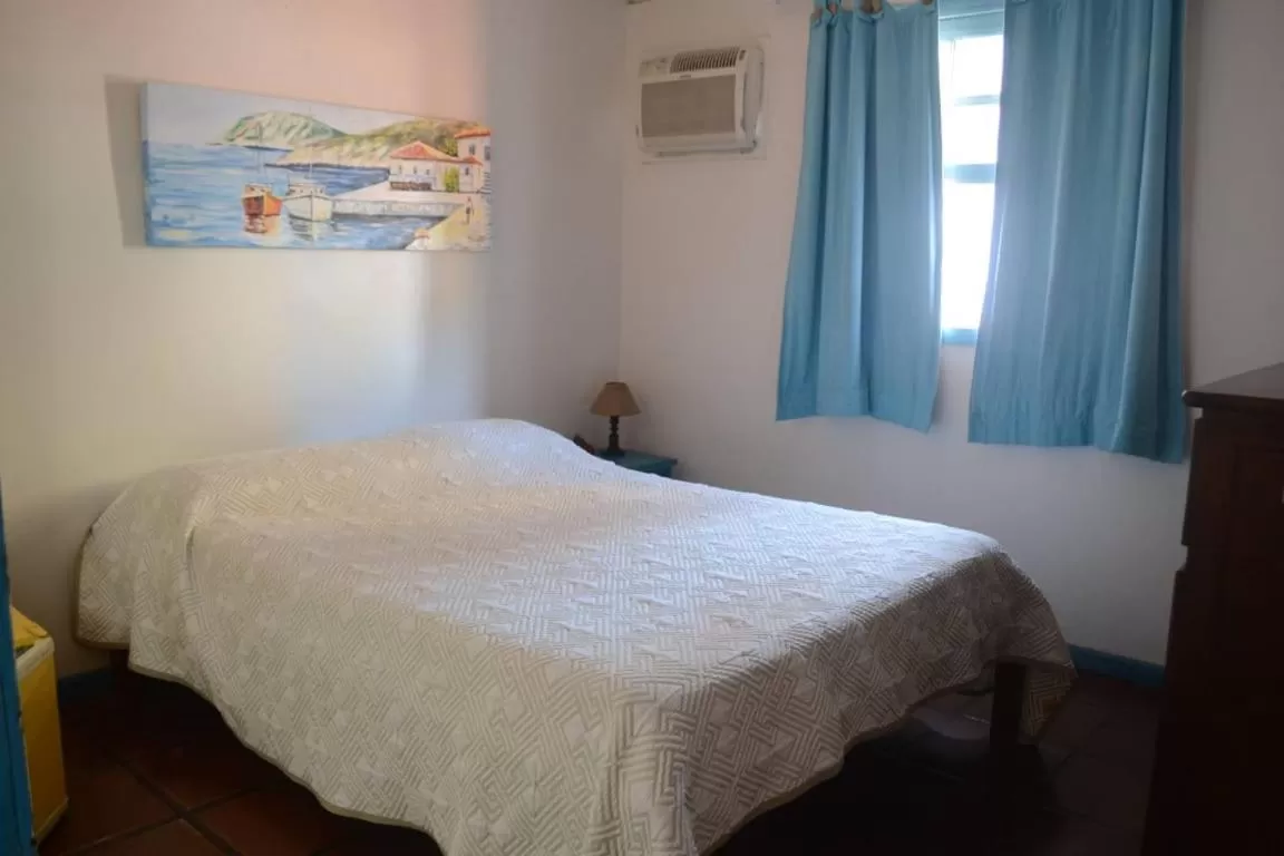 Bed in Pousada L'escale