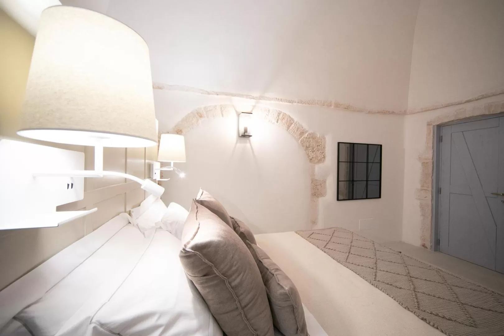 Bed in San Marco Boutique Rooms