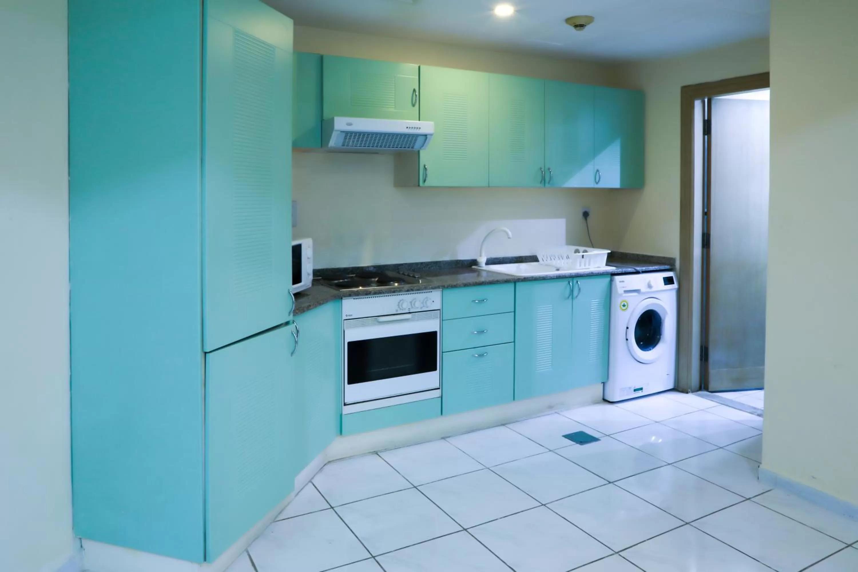 kitchen in West Zone Pearl Hotel Apartment