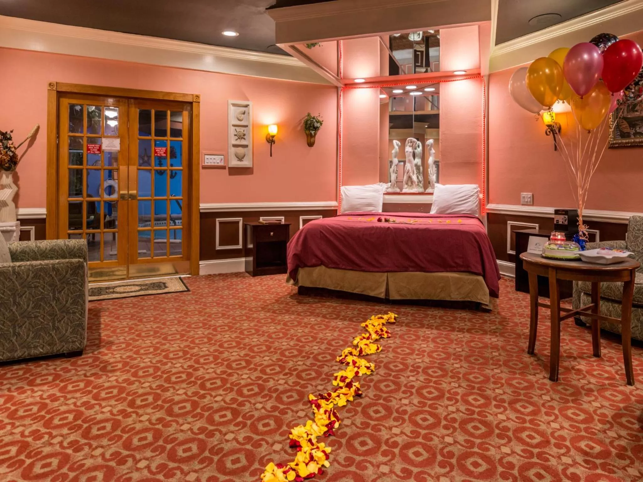 Bed in Inn of The Dove Romantic Luxury & Business Suites