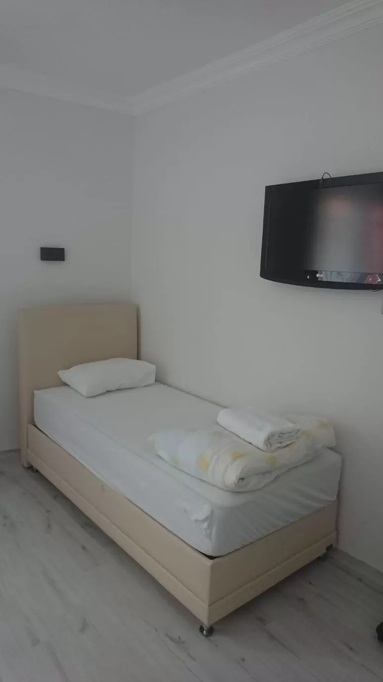 Bed in Ali's Pension