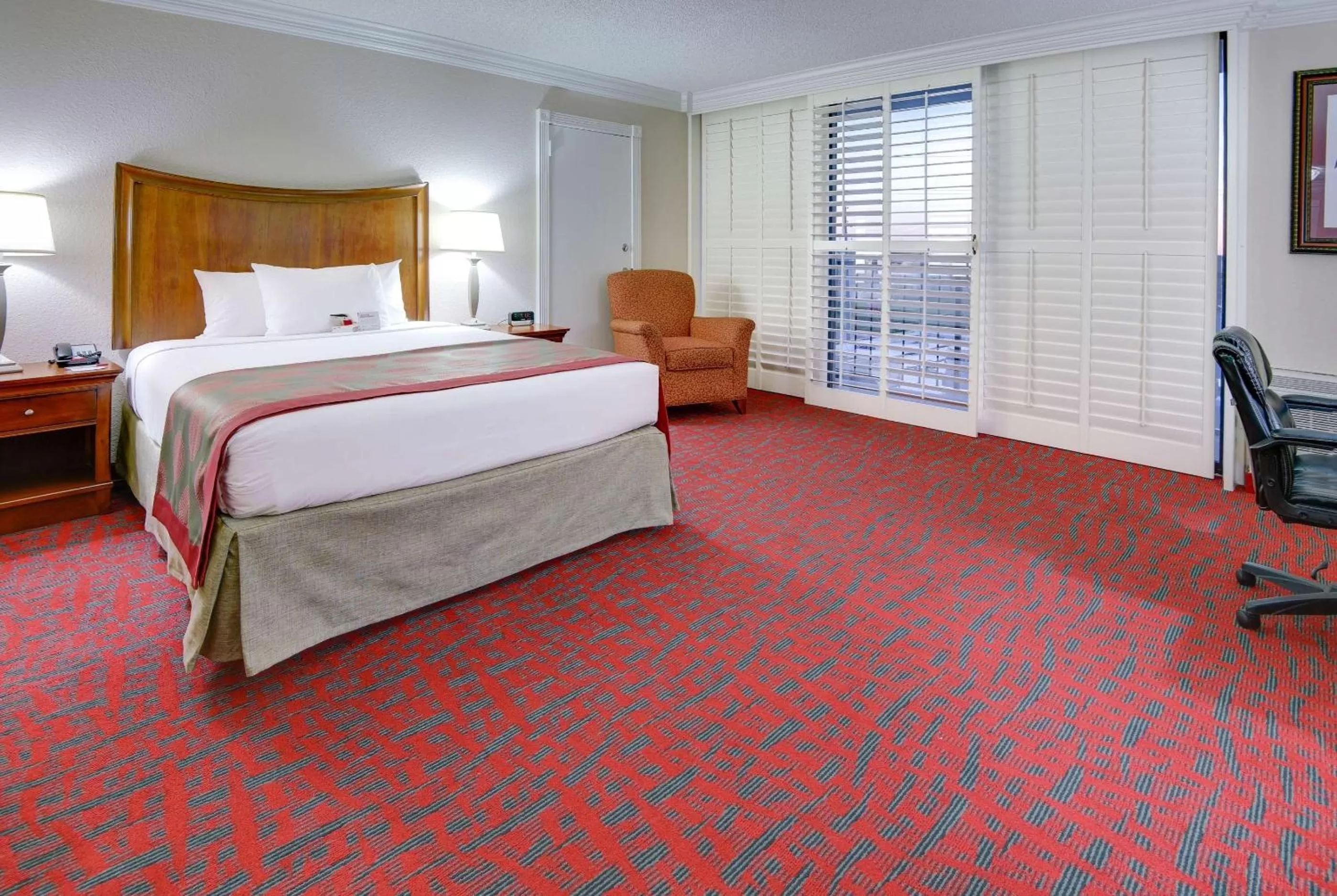 Photo of the whole room, Bed in Ramada by Wyndham Metairie New Orleans Airport