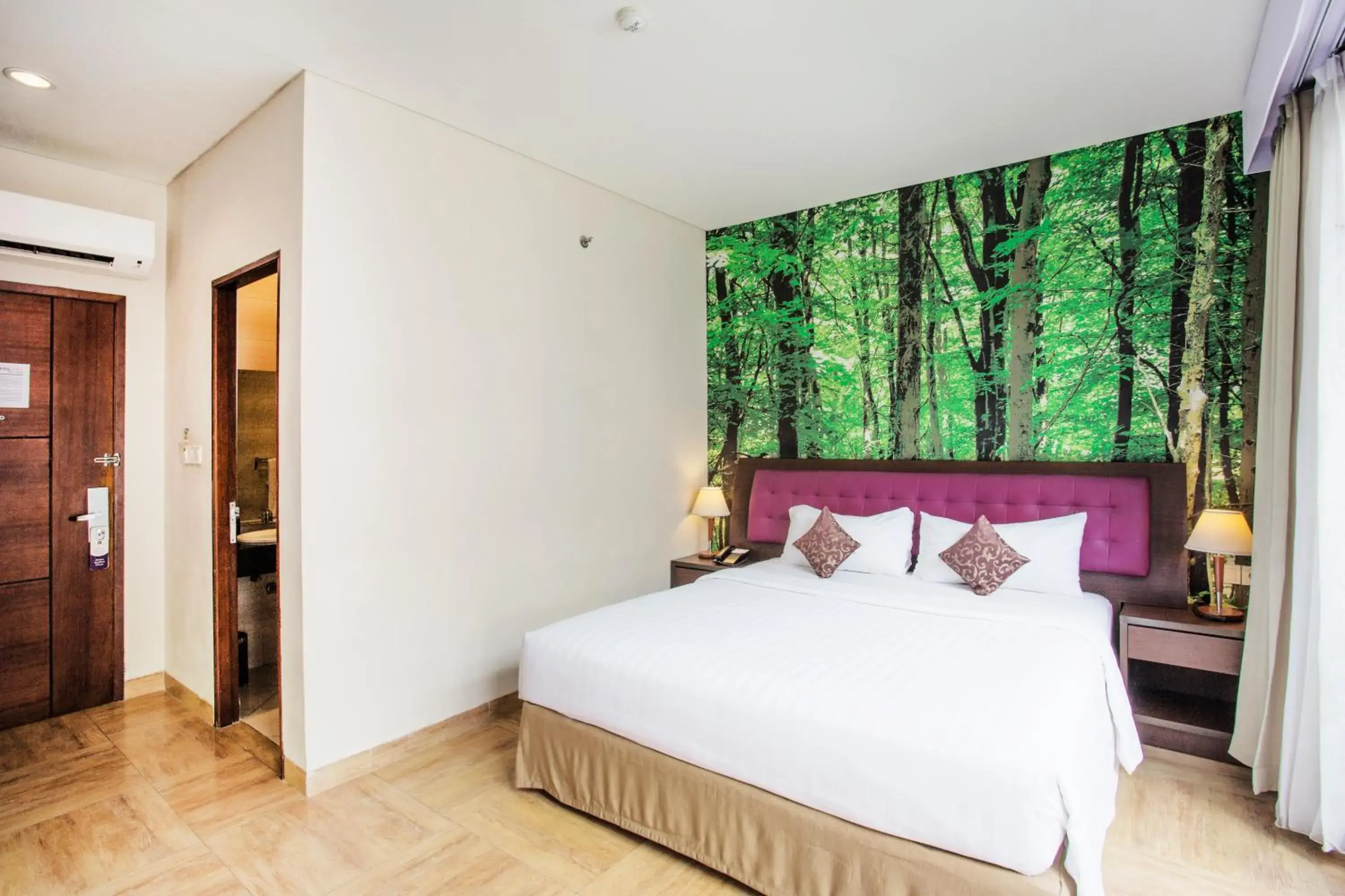 Deluxe Double or Twin Room with Balcony in Kuta Central Park Hotel Deluxe Double or Twin Room with Balcony in Kuta Central Park Hotel