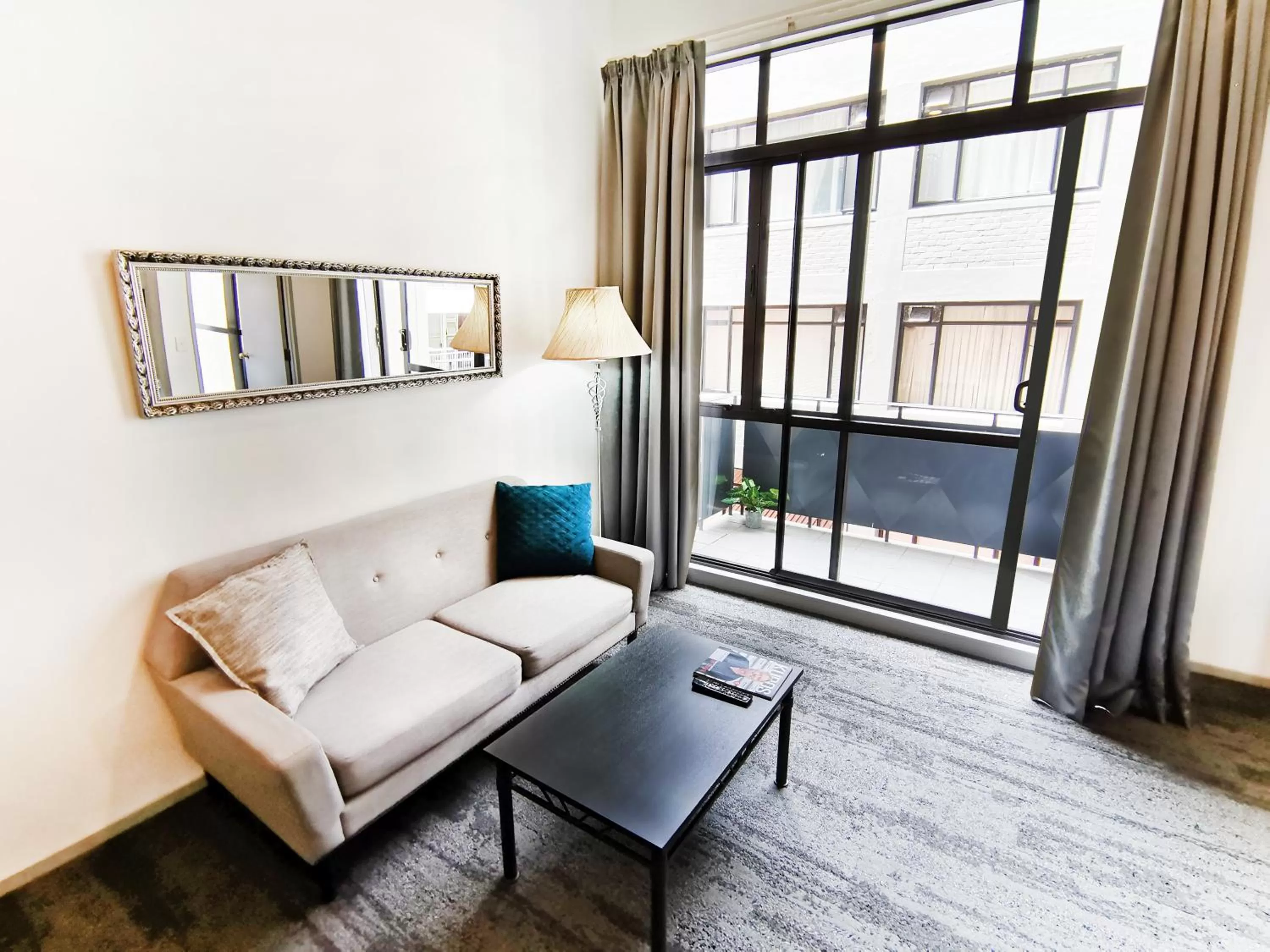 Living room in Quest on Eden Auckland CBD Apartment Hotel