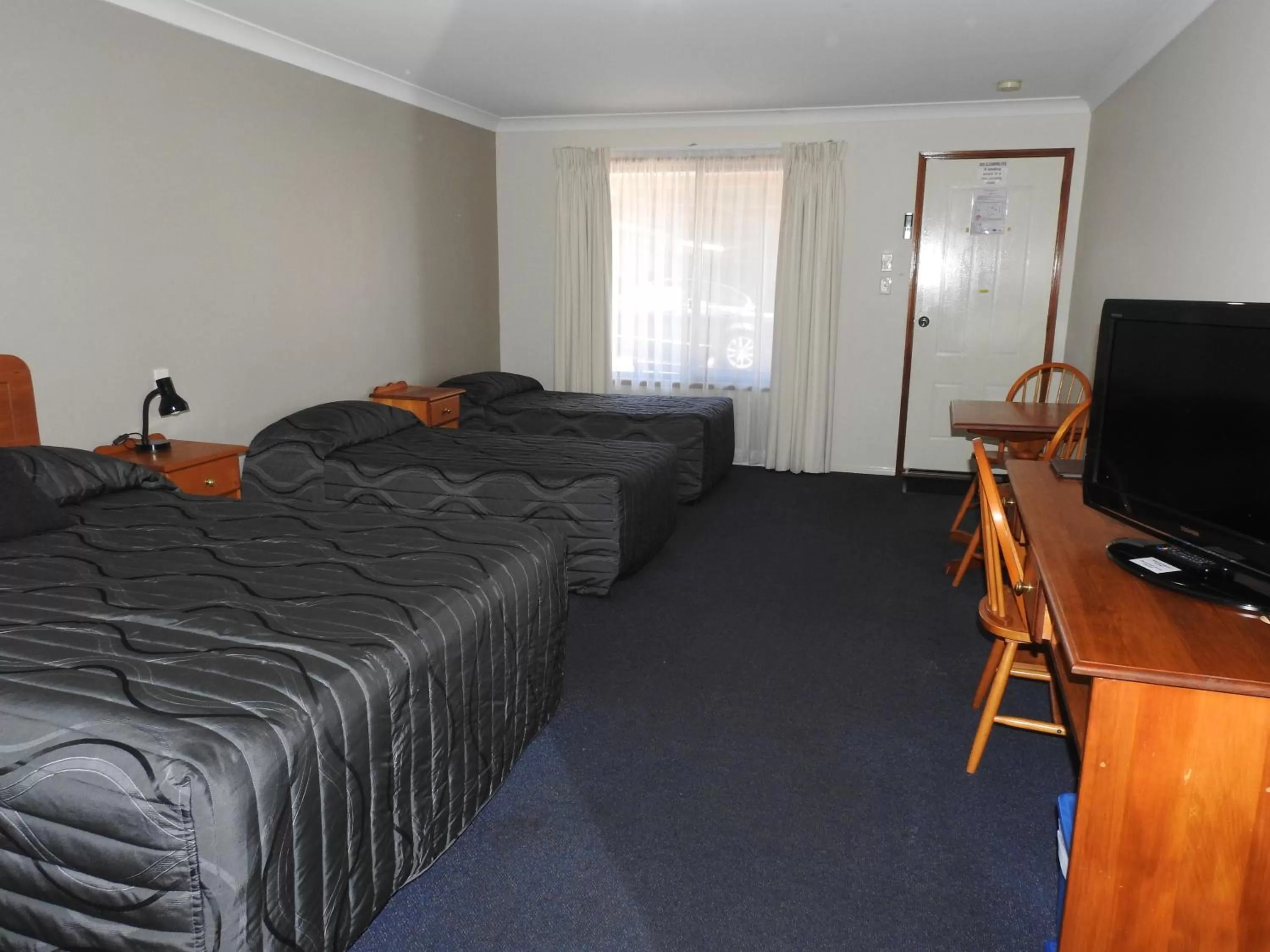 Bedroom in Asters On James Motor Inn