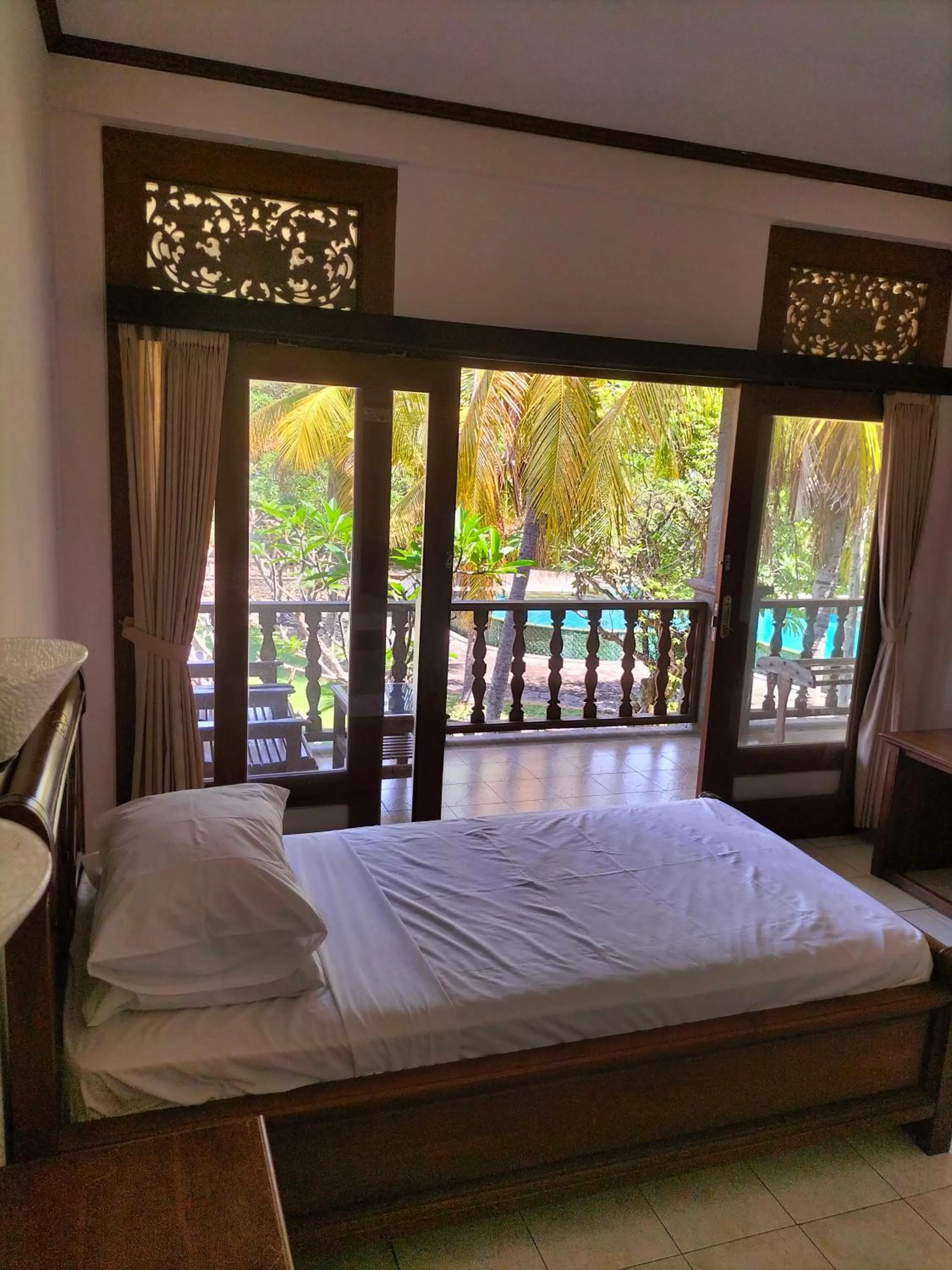Bed in Nirwana Sea Side Cottages