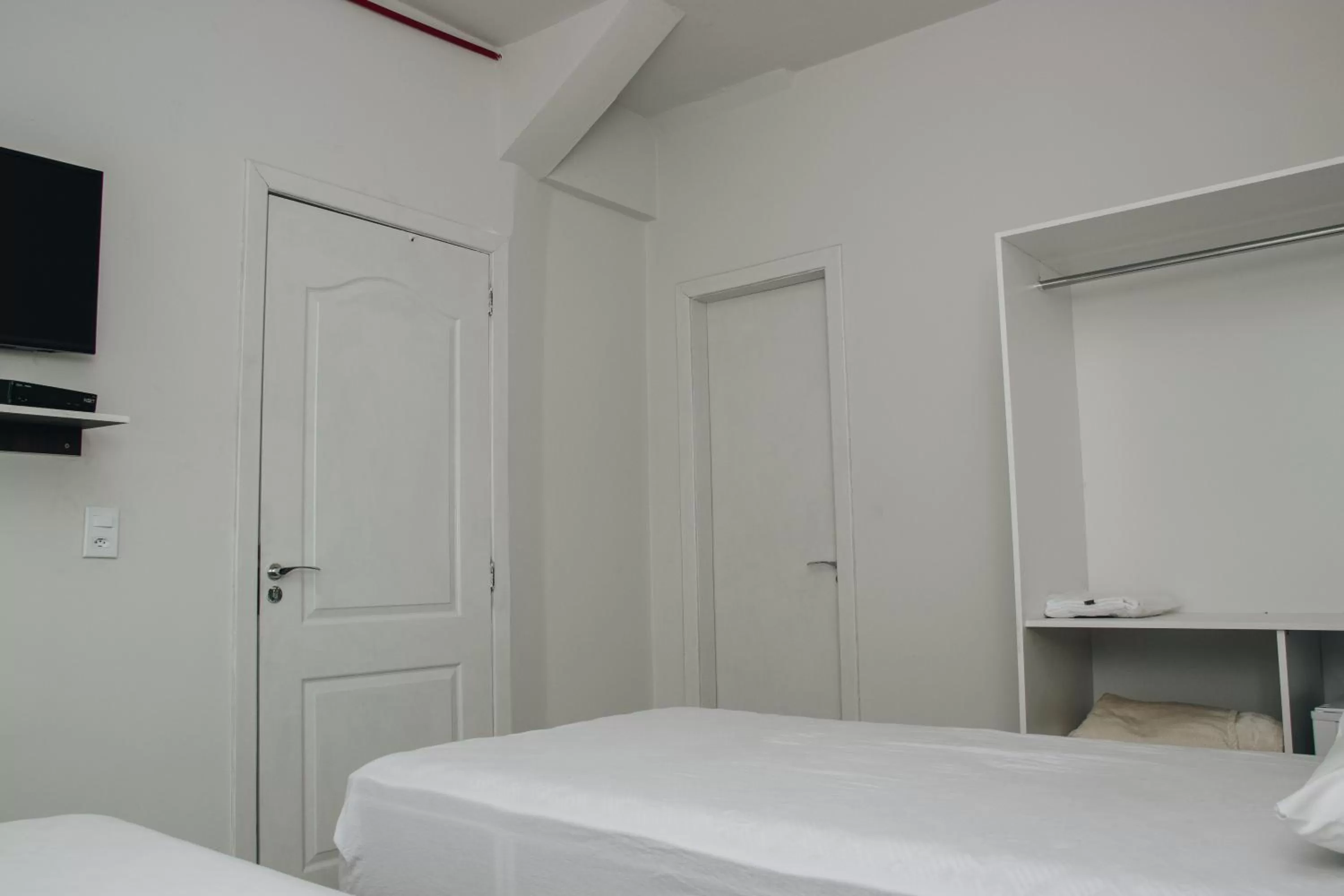 Bed in SAMIR HOTEL COMFORT