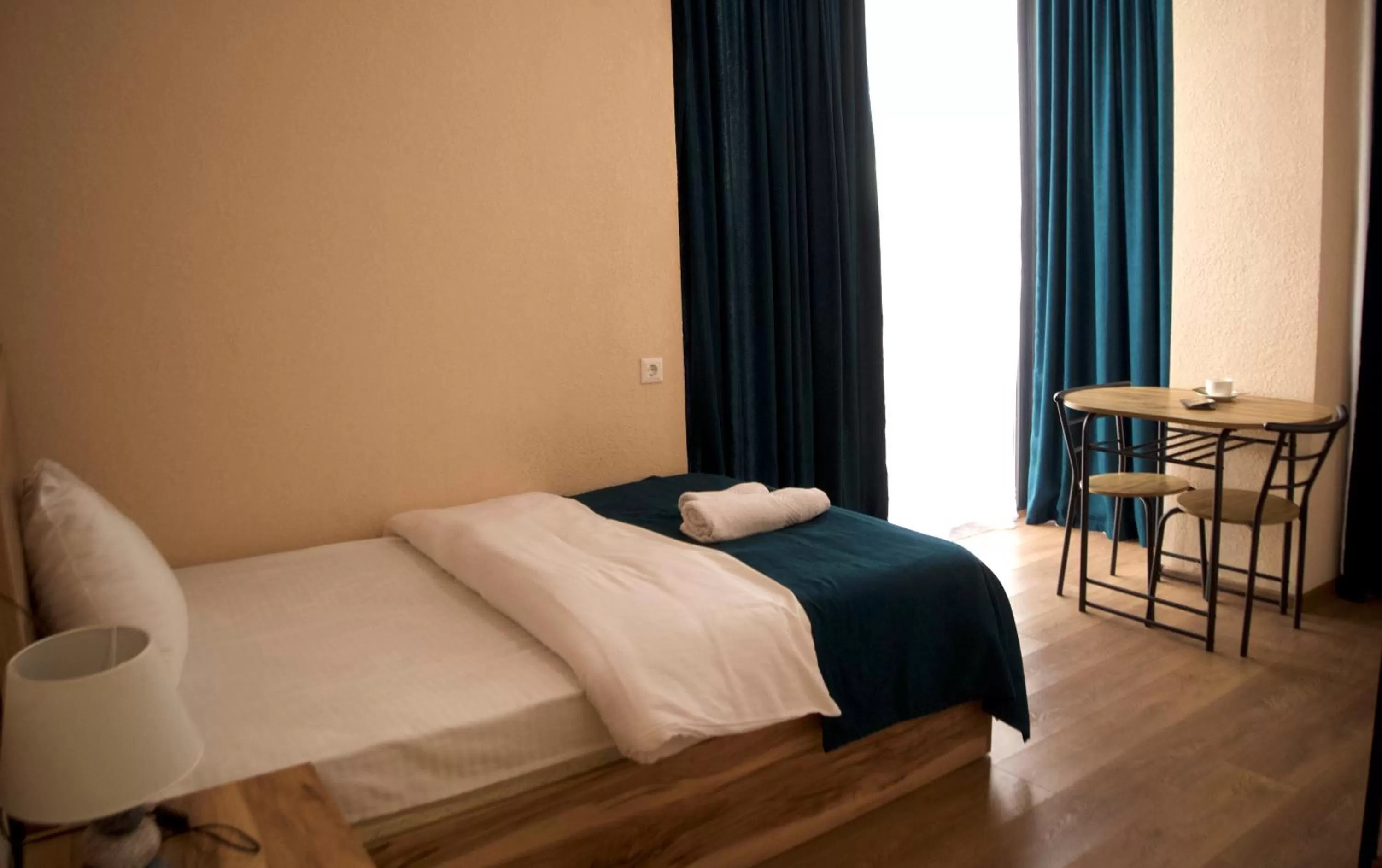 Bed in Bessarion Boutique Hotel