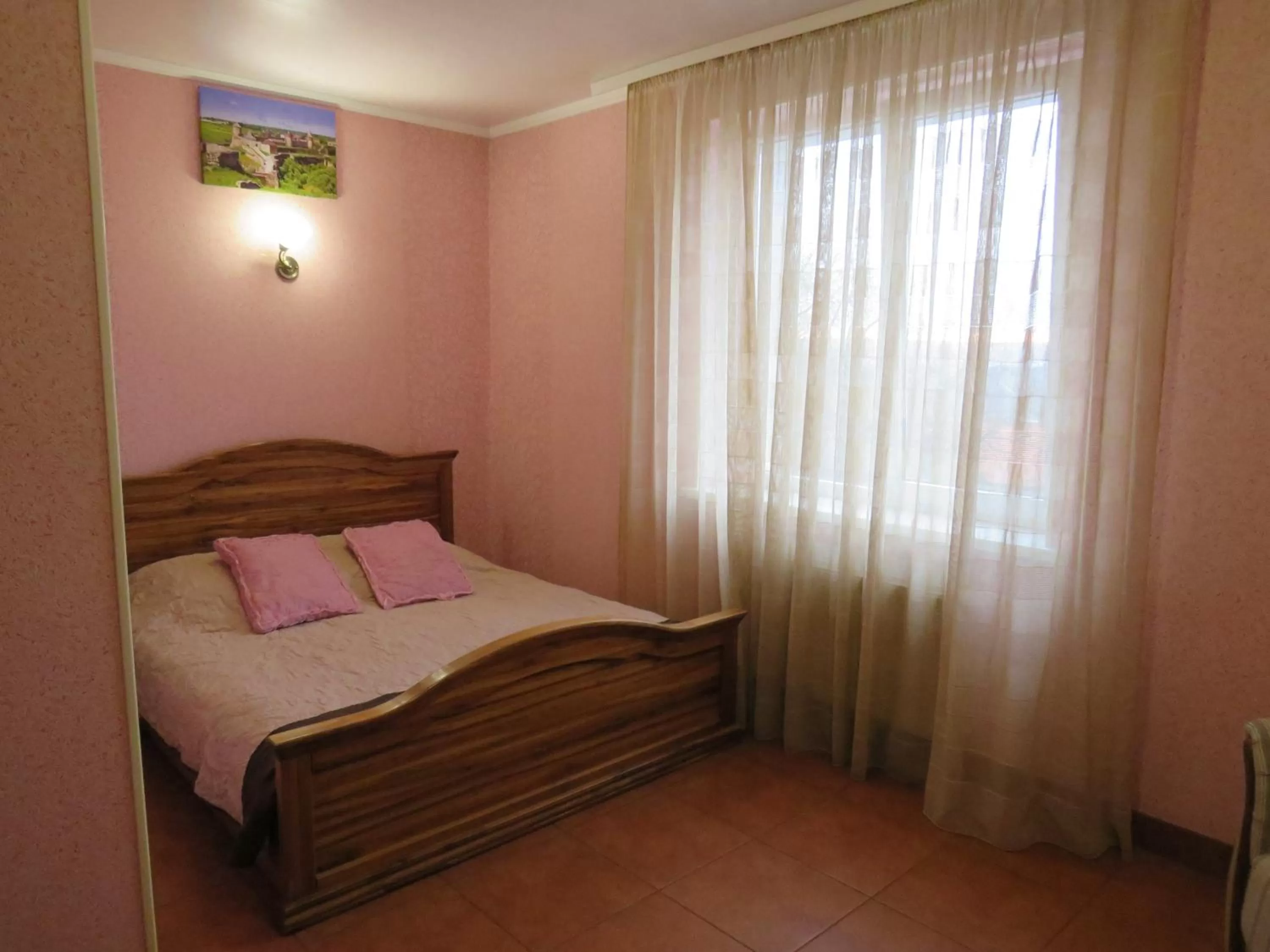 Bed in Monte-Kristo Hotel