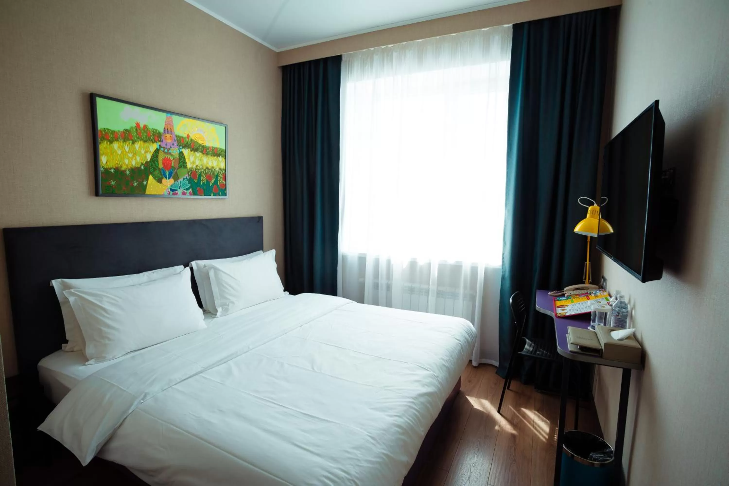 Bed in City Hotel Shymkent
