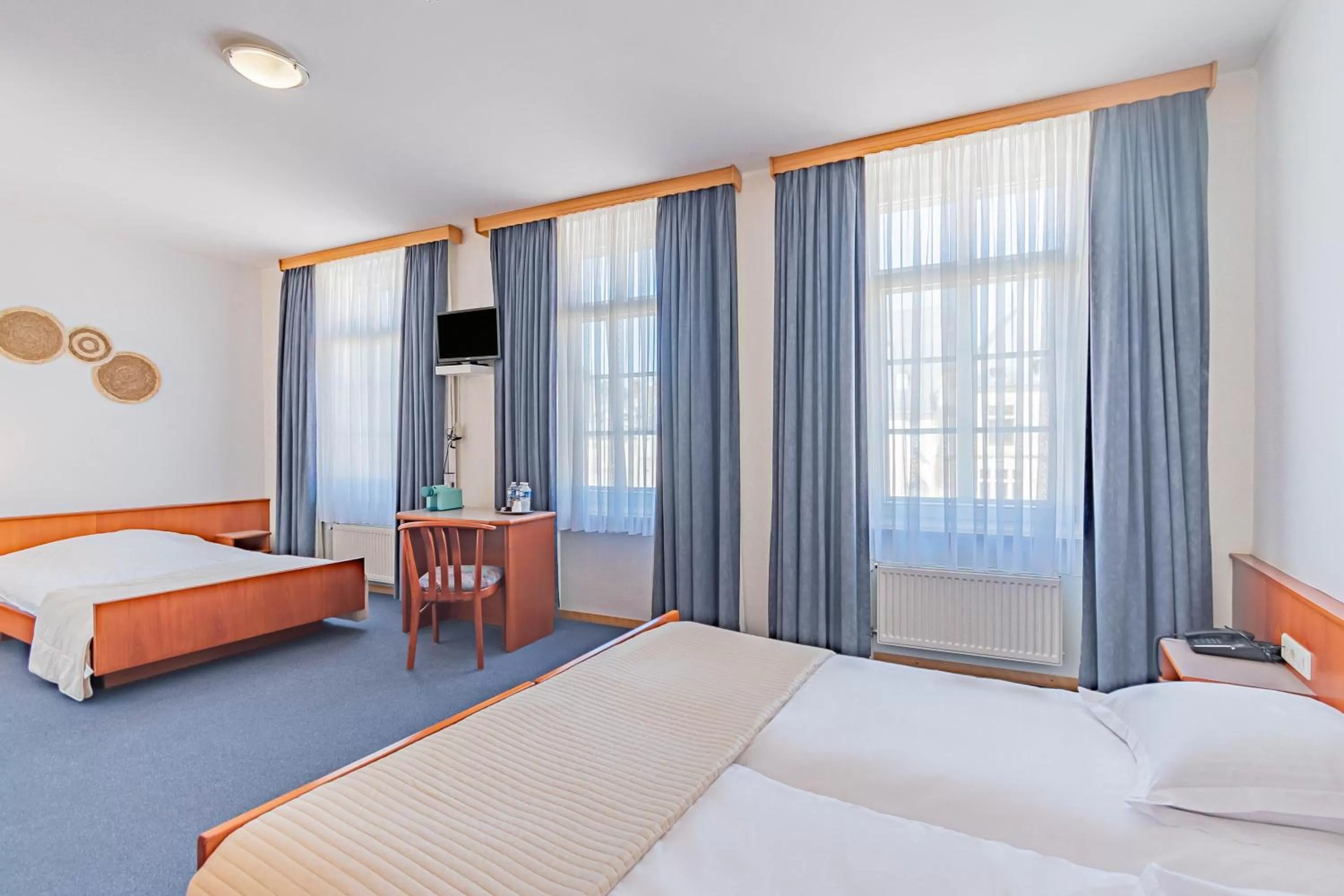 Bed in Hôtel Le Petit Poète