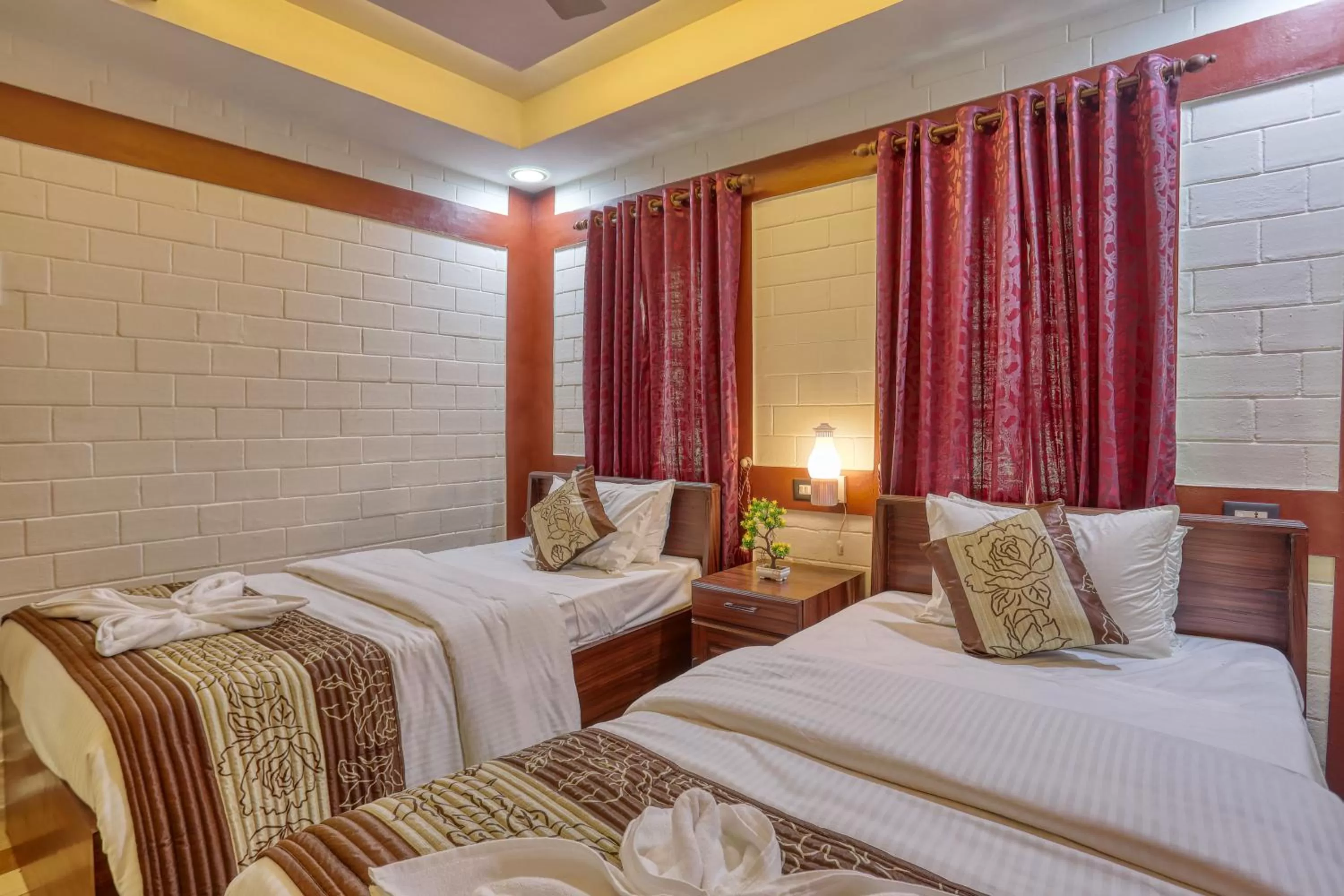 Bed in LEISURE VALLEY BEACH RESORT