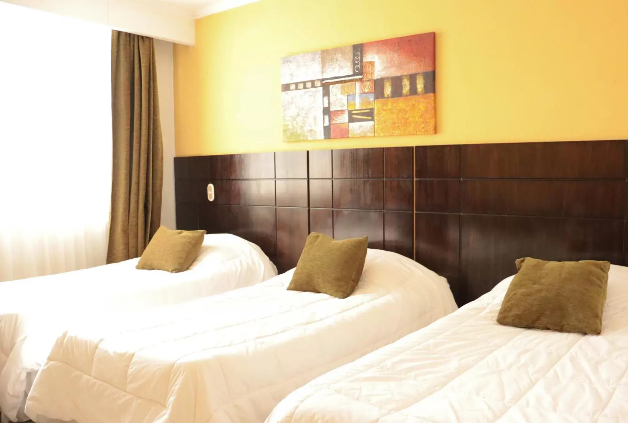 Classic Triple Room in Hotel Terrano Concepción Classic Triple Room in Hotel Terrano Concepción