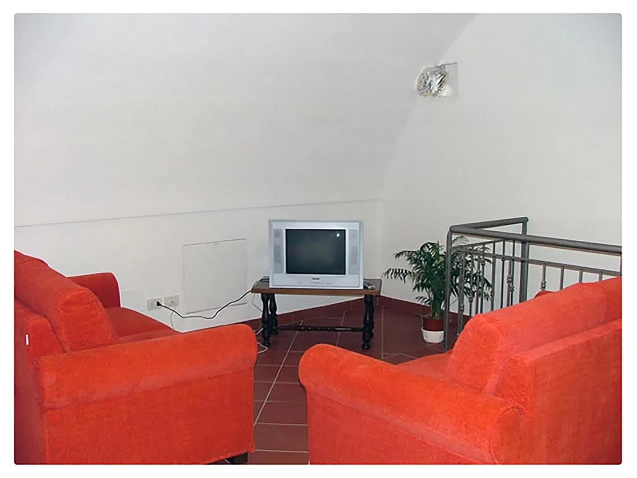 Communal lounge/ TV room in B&B San Rocco