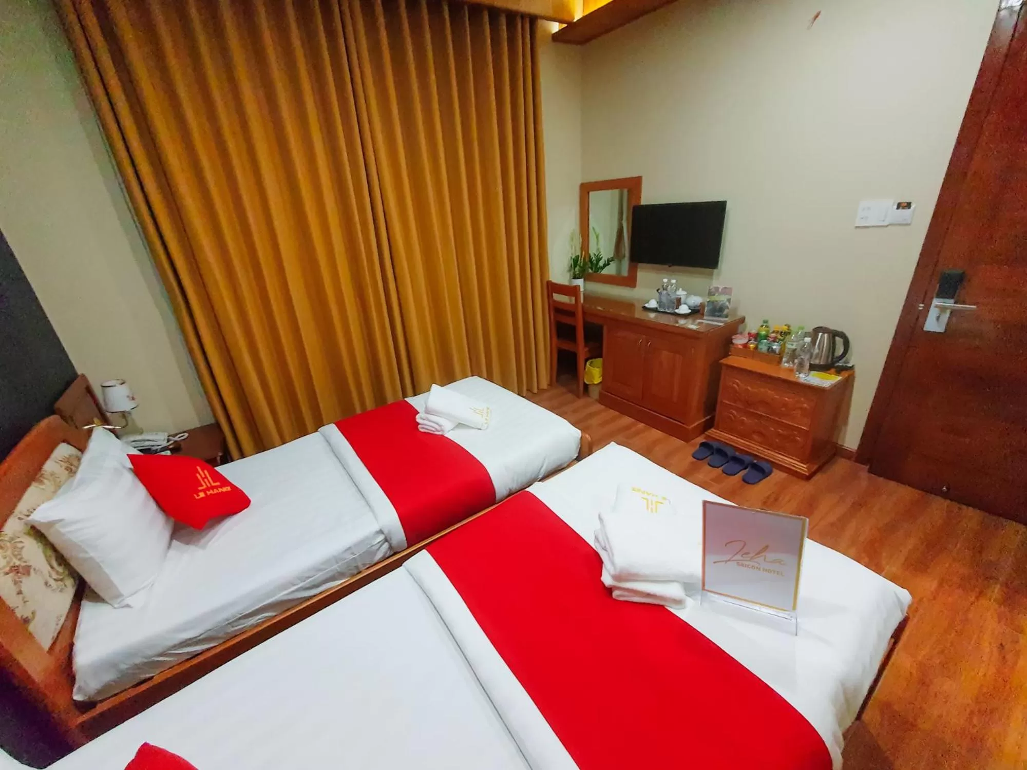 Bed in LEHA Saigon Hotel Airport