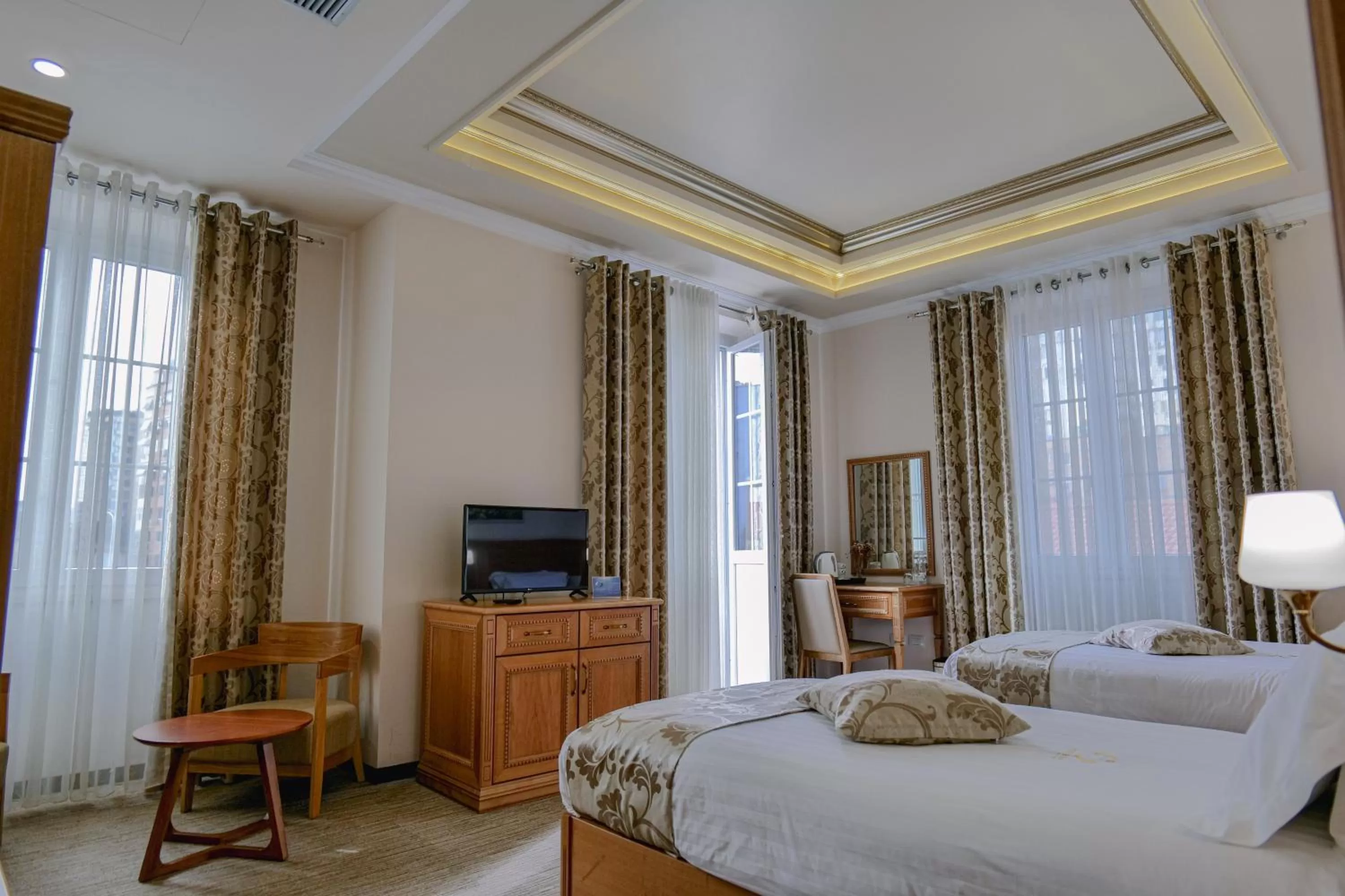 Communal lounge/ TV room, Bed in Hotel Boka