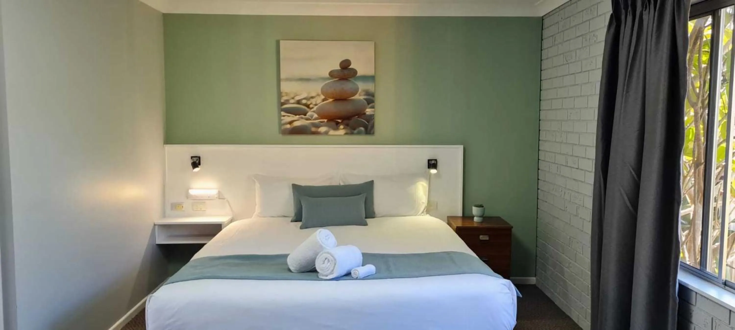 Bed in Marco Polo Motor Inn Taree