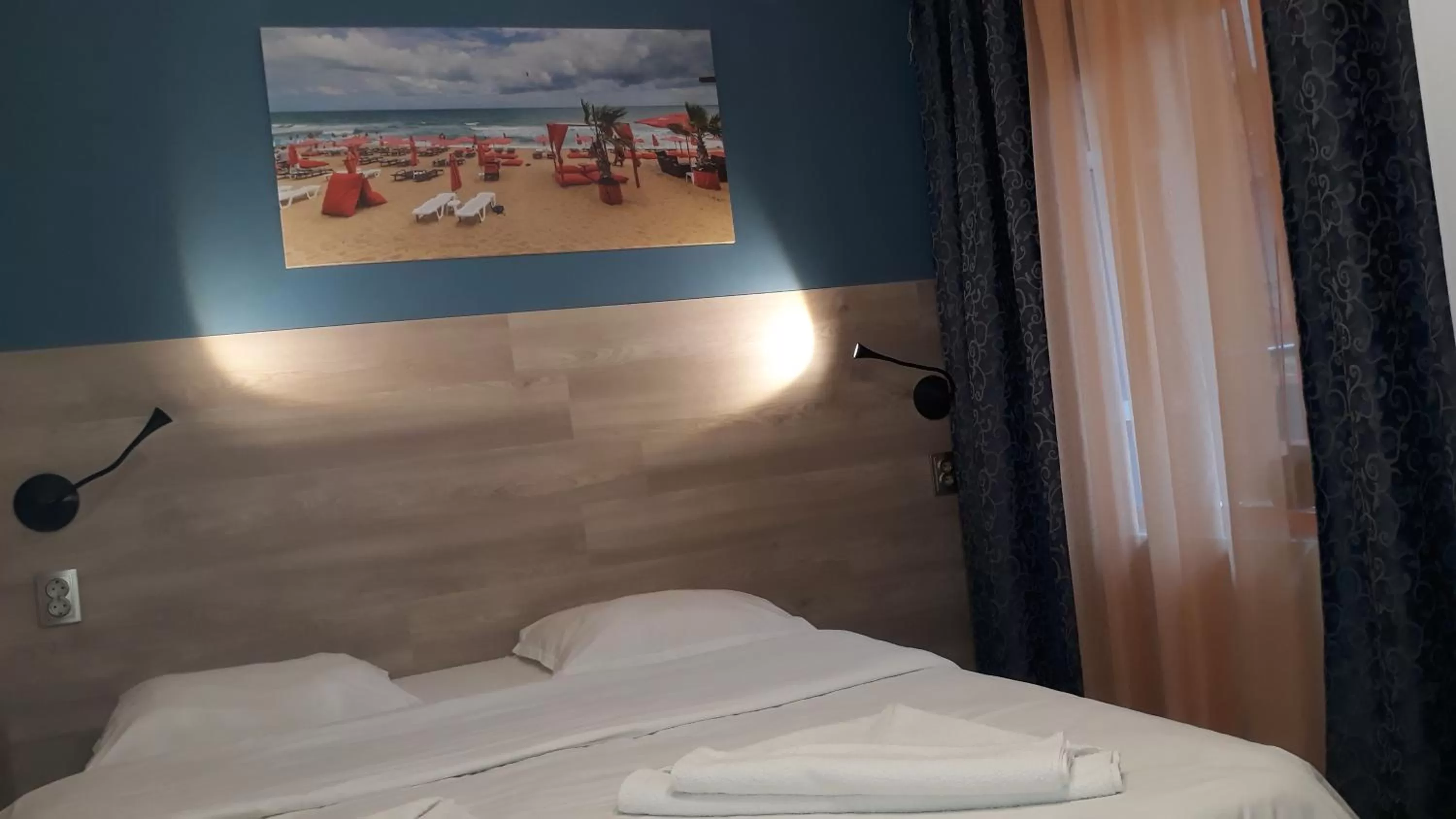 Bed in Family Hotel Jemelly