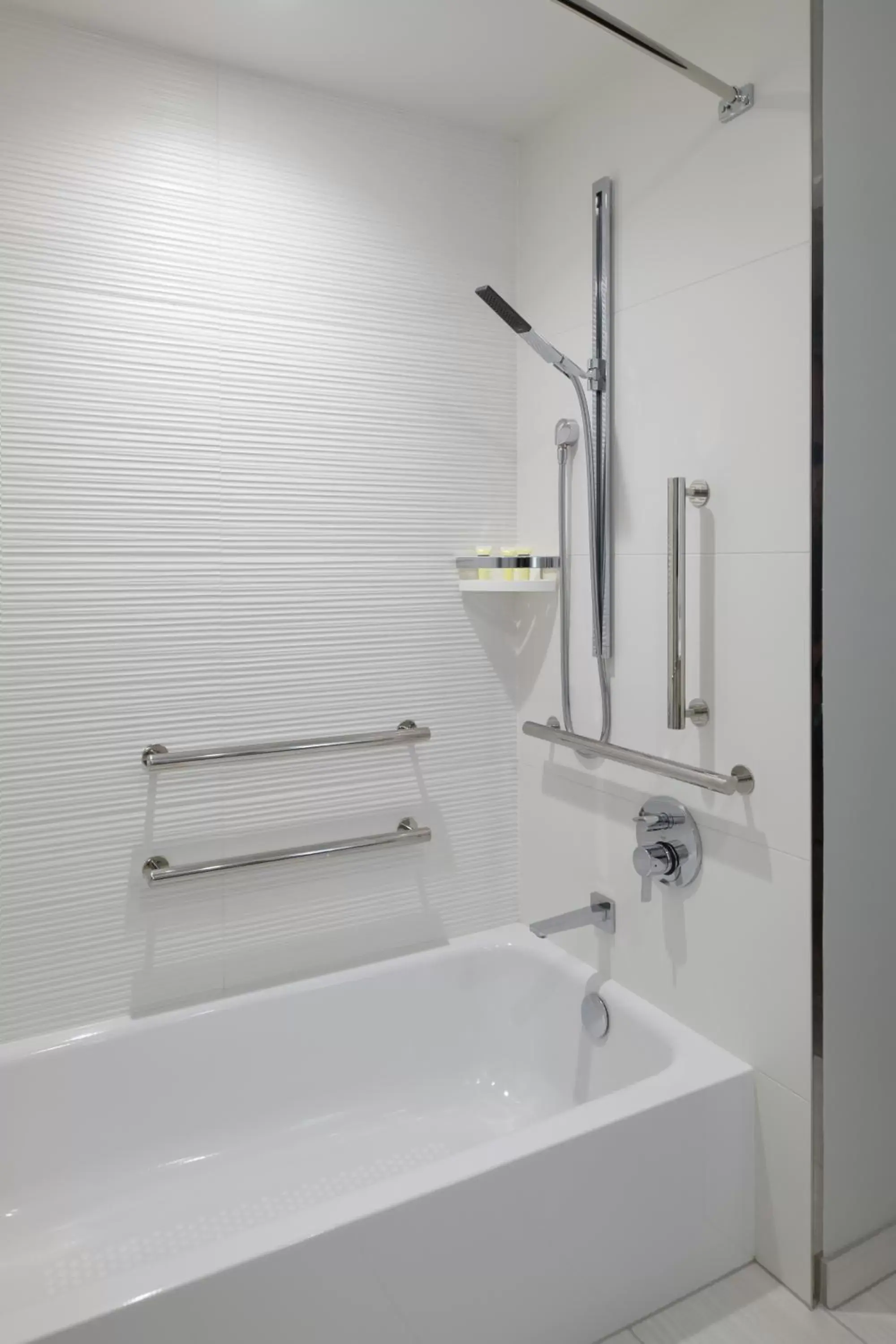 King Room with Skyline View and Adapted Tub - Mobility Accessible in Astra Hotel, Seattle, a Tribute Portfolio Hotel King Room with Skyline View and Adapted Tub - Mobility Accessible in Astra Hotel, Seattle, a Tribute Portfolio Hotel