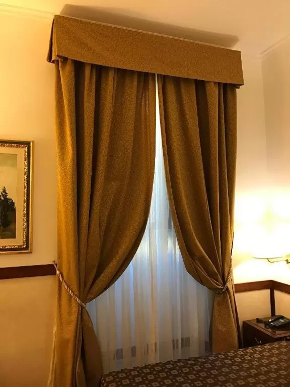 Bed in Hotel Astoria Garden