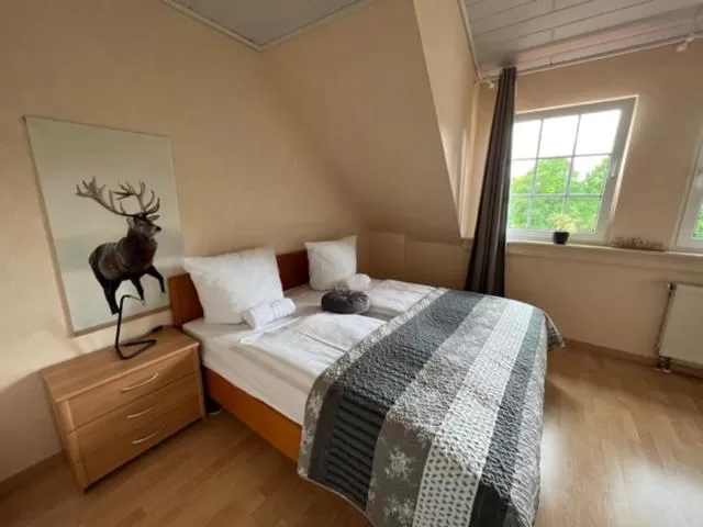 Bed in Hotel Rehkitz