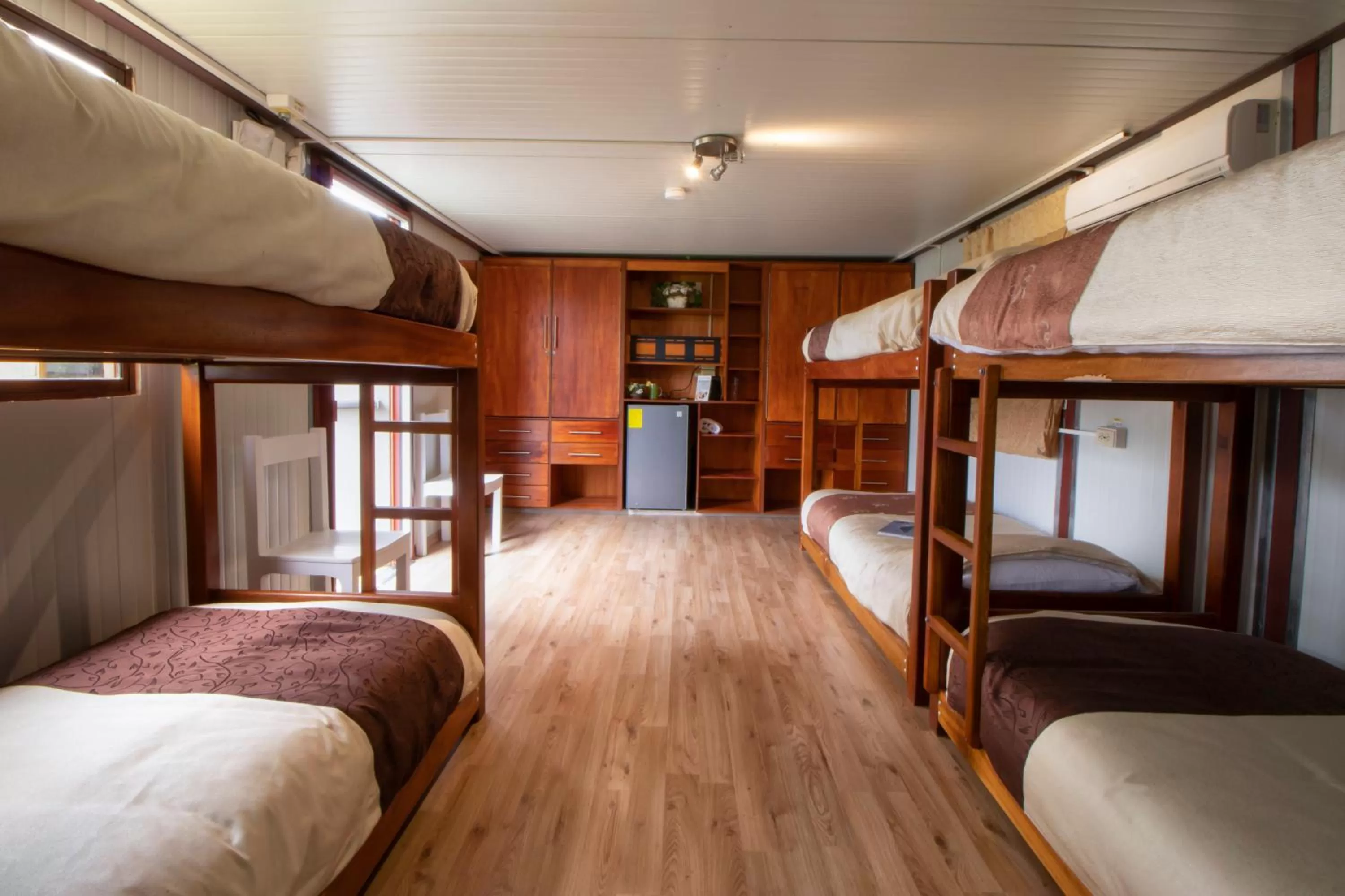 Bed in Hosteria Papagayo Cotopaxi