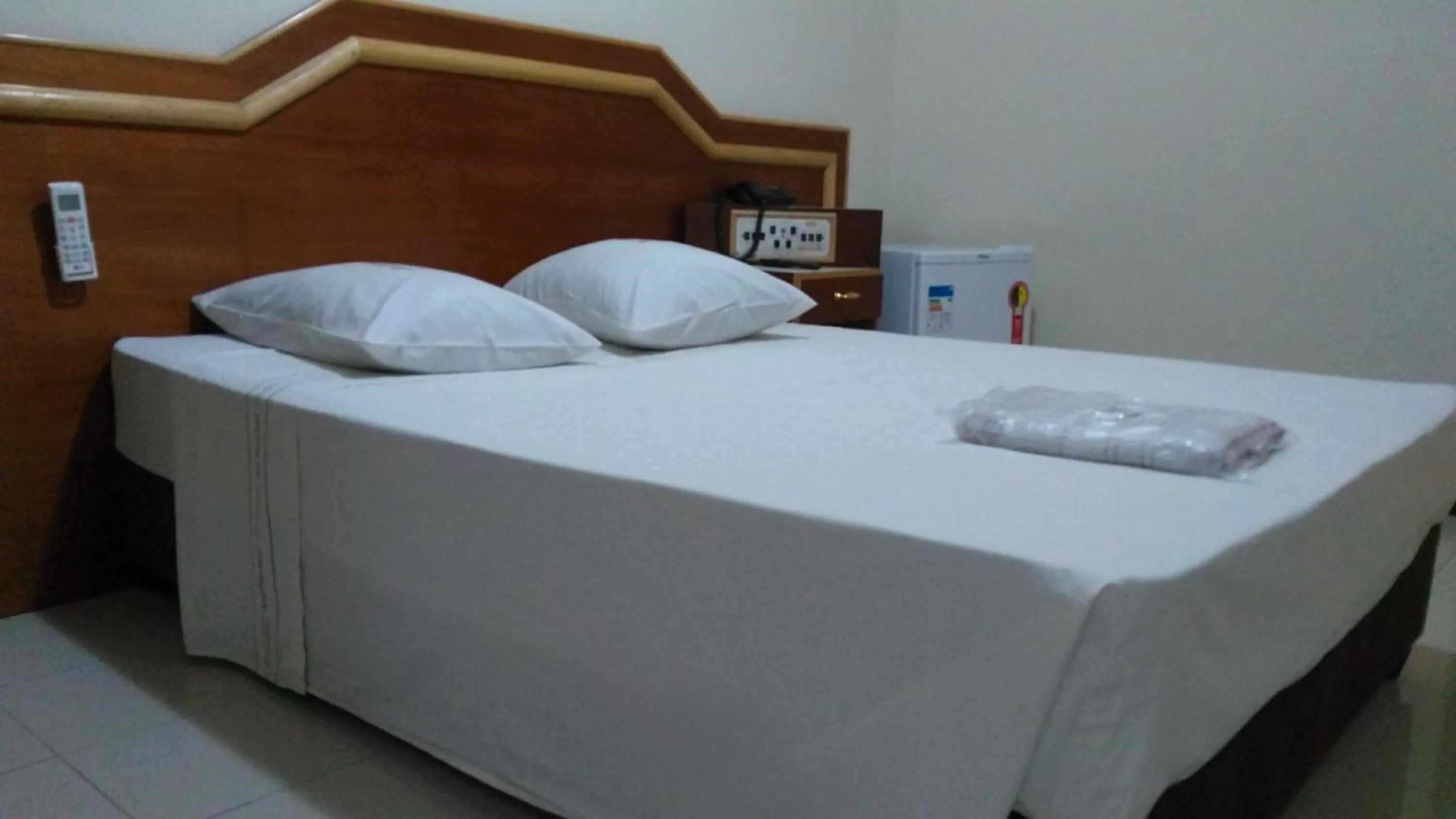 Bed in Aero Plaza Hotel