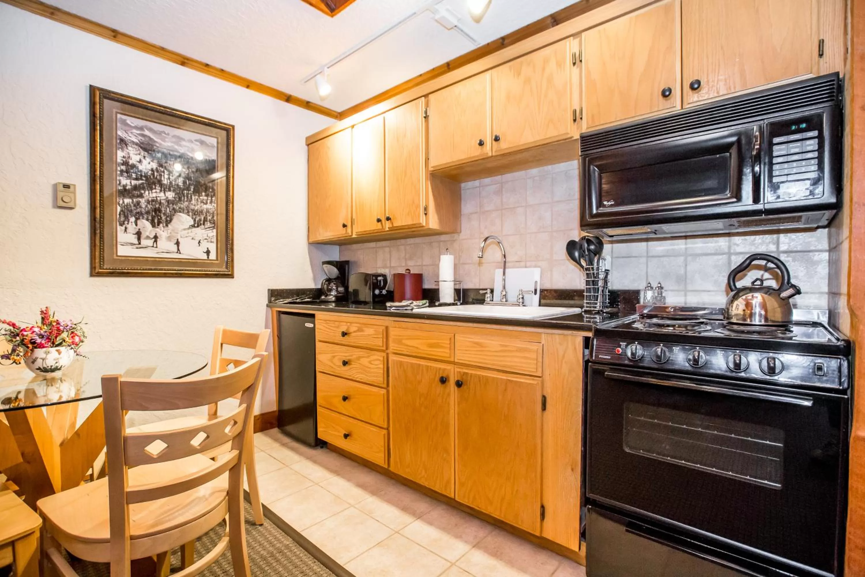 Kitchen or kitchenette in Kandahar Lodge at Whitefish Mountain Resort