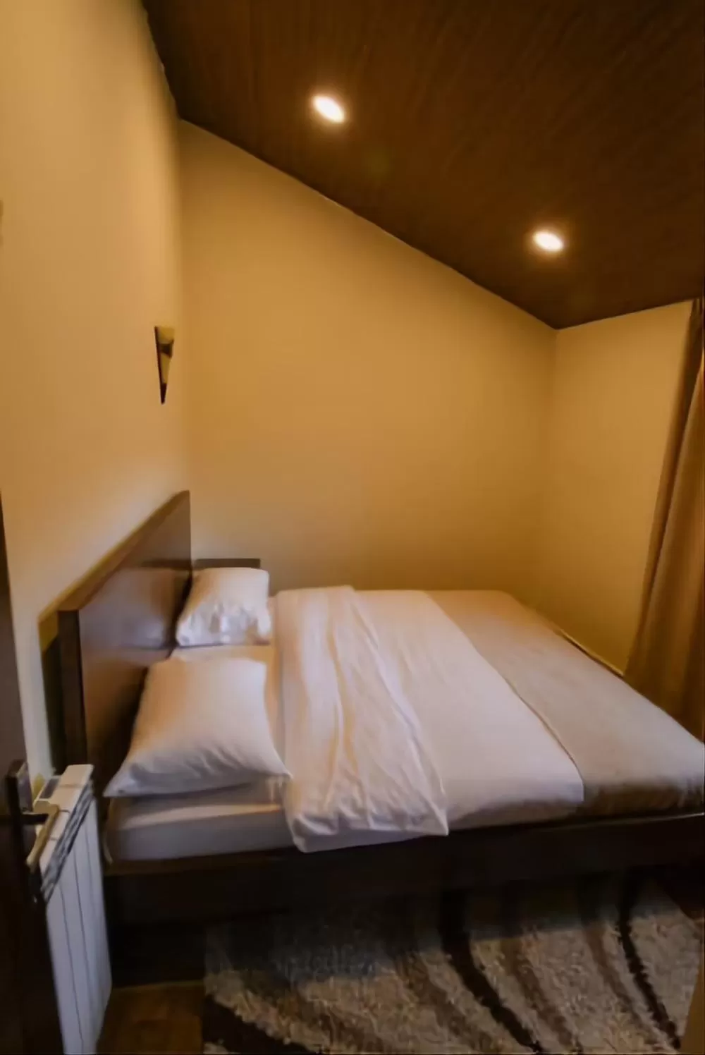 Bed in Hotel L'Aiglon