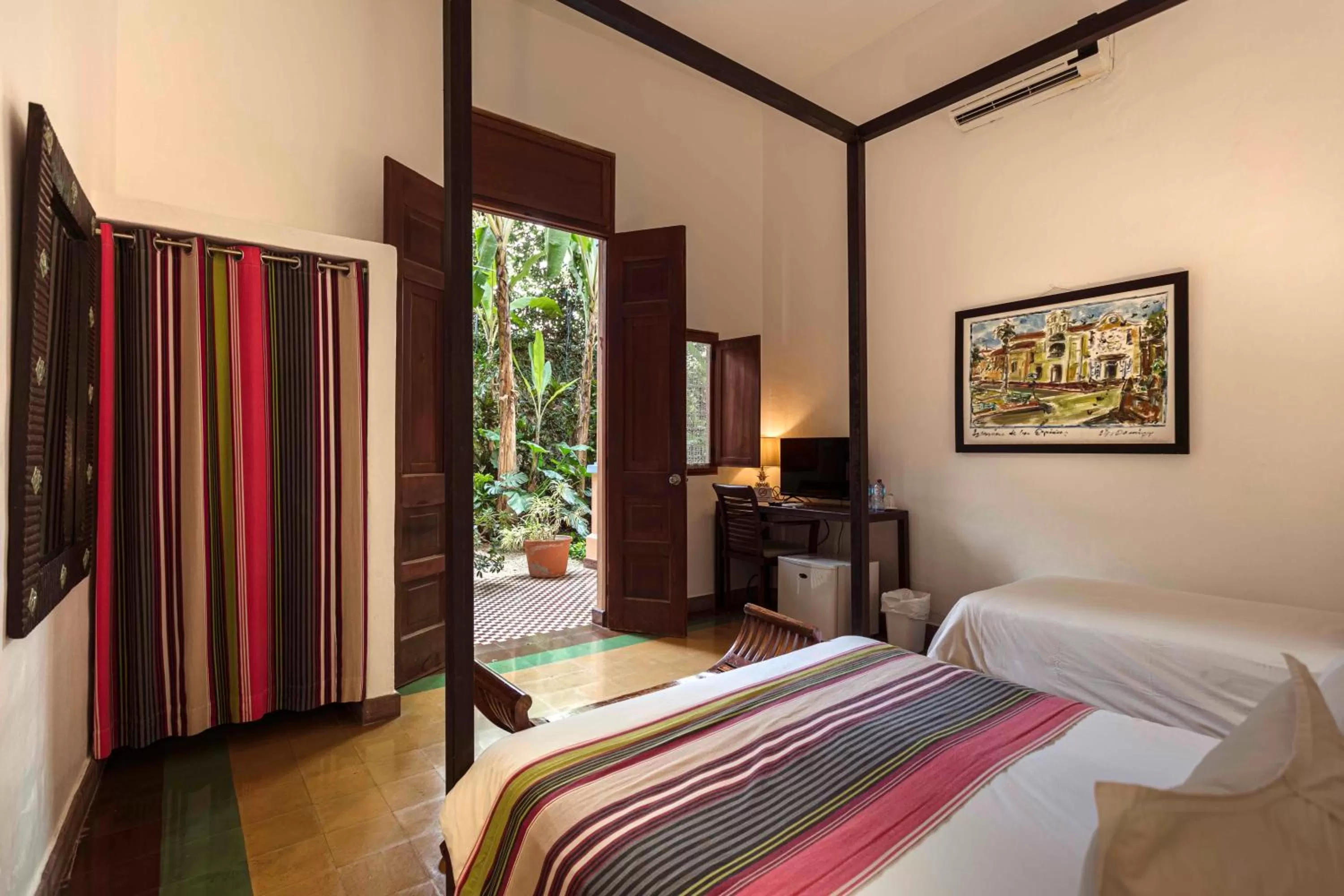 Bed in Hotel Villa Colonial