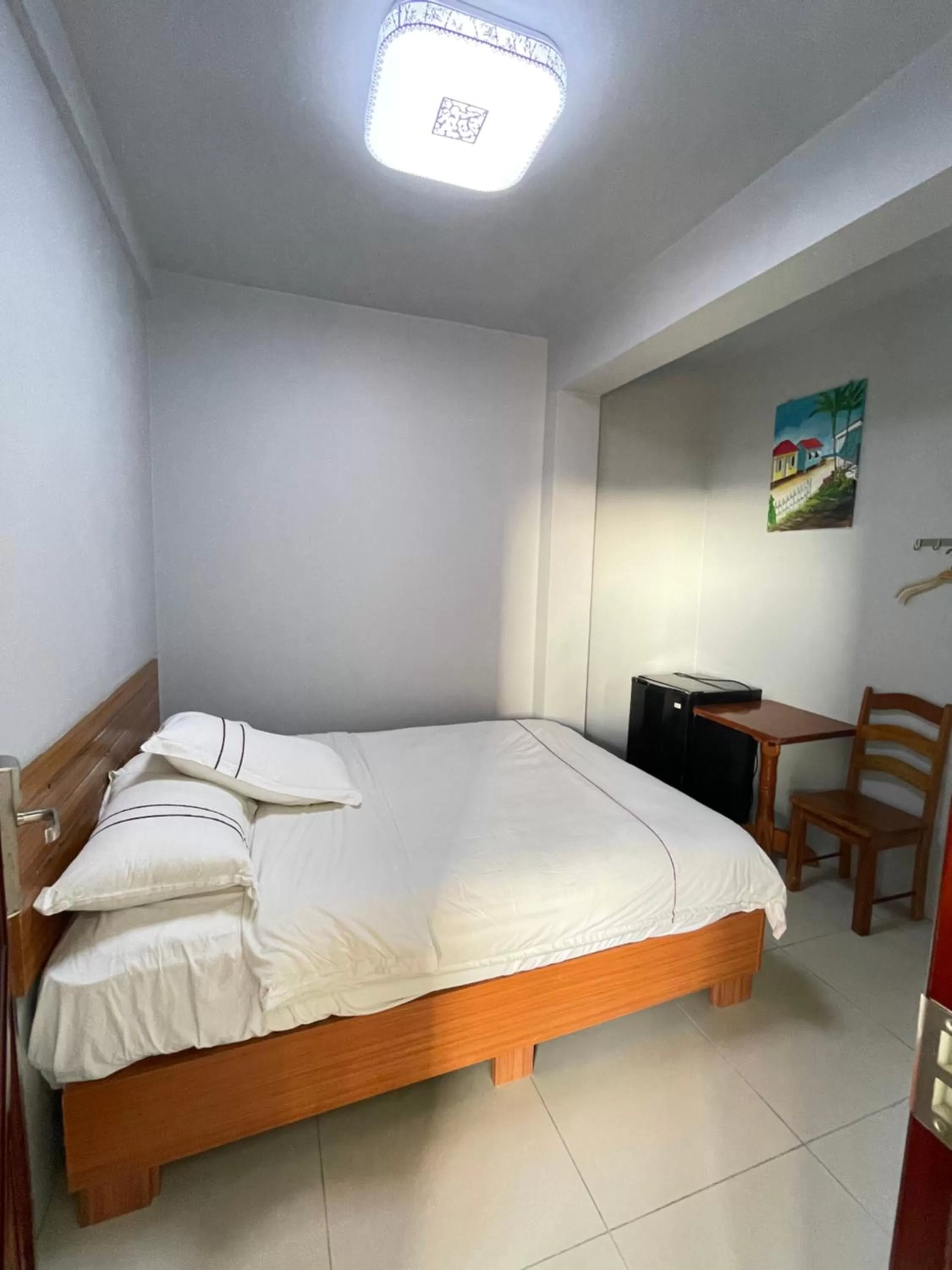 Bed in Caye Caulker Beach Hotel