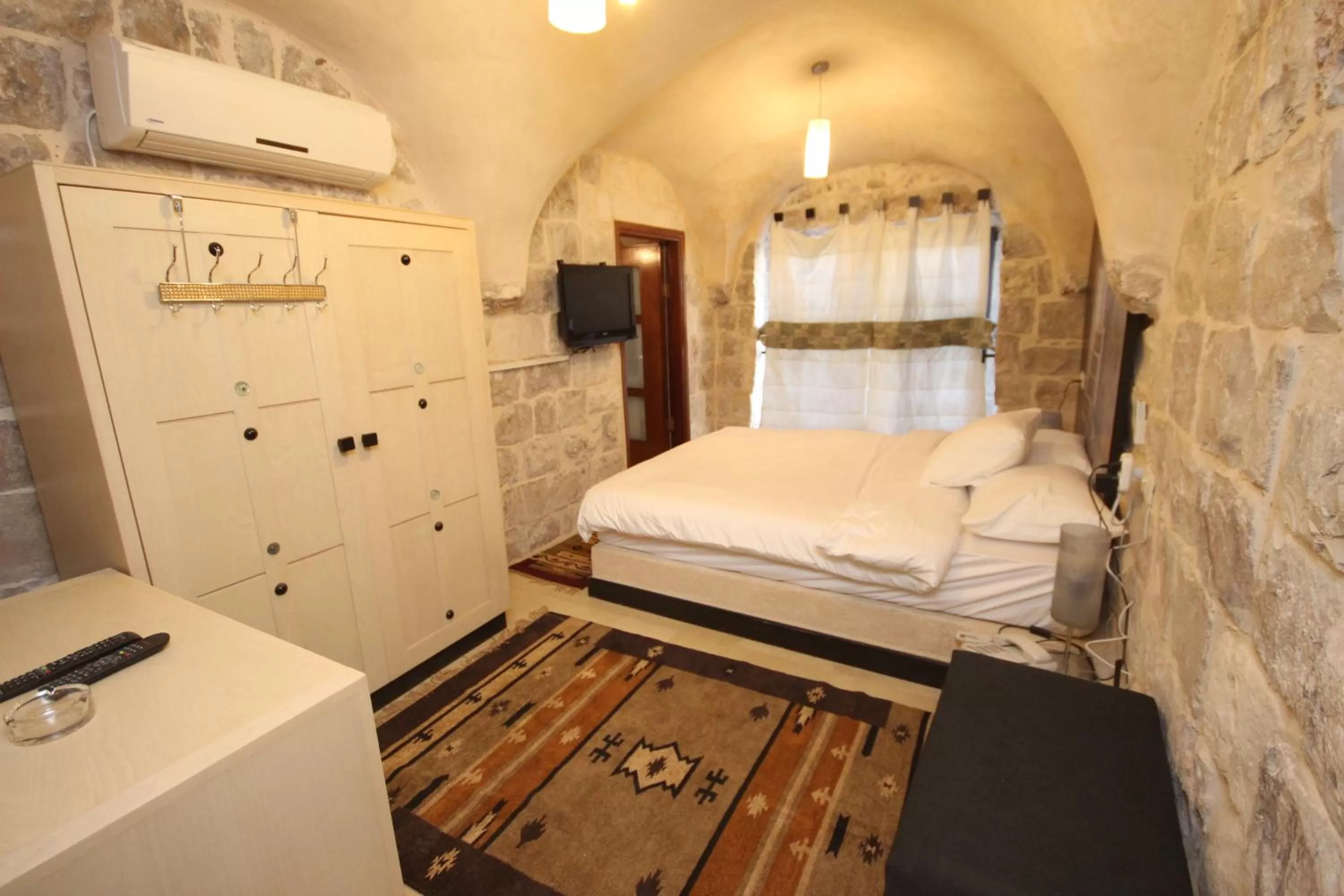 Decorative detail, Bed in Khan Alwakala Hotel