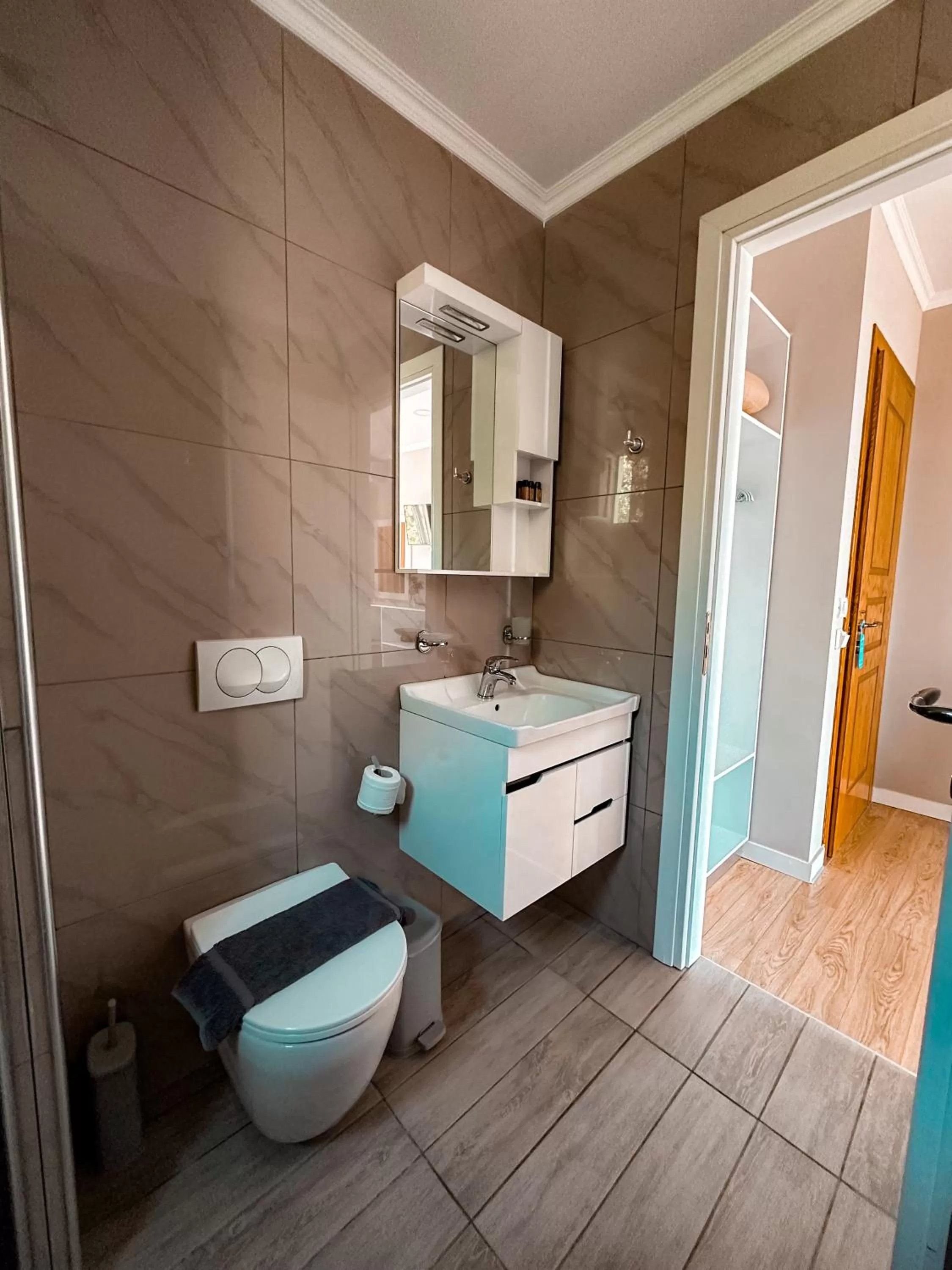 Toilet, Bathroom in Aphrodite Garden Rooms & Apartment