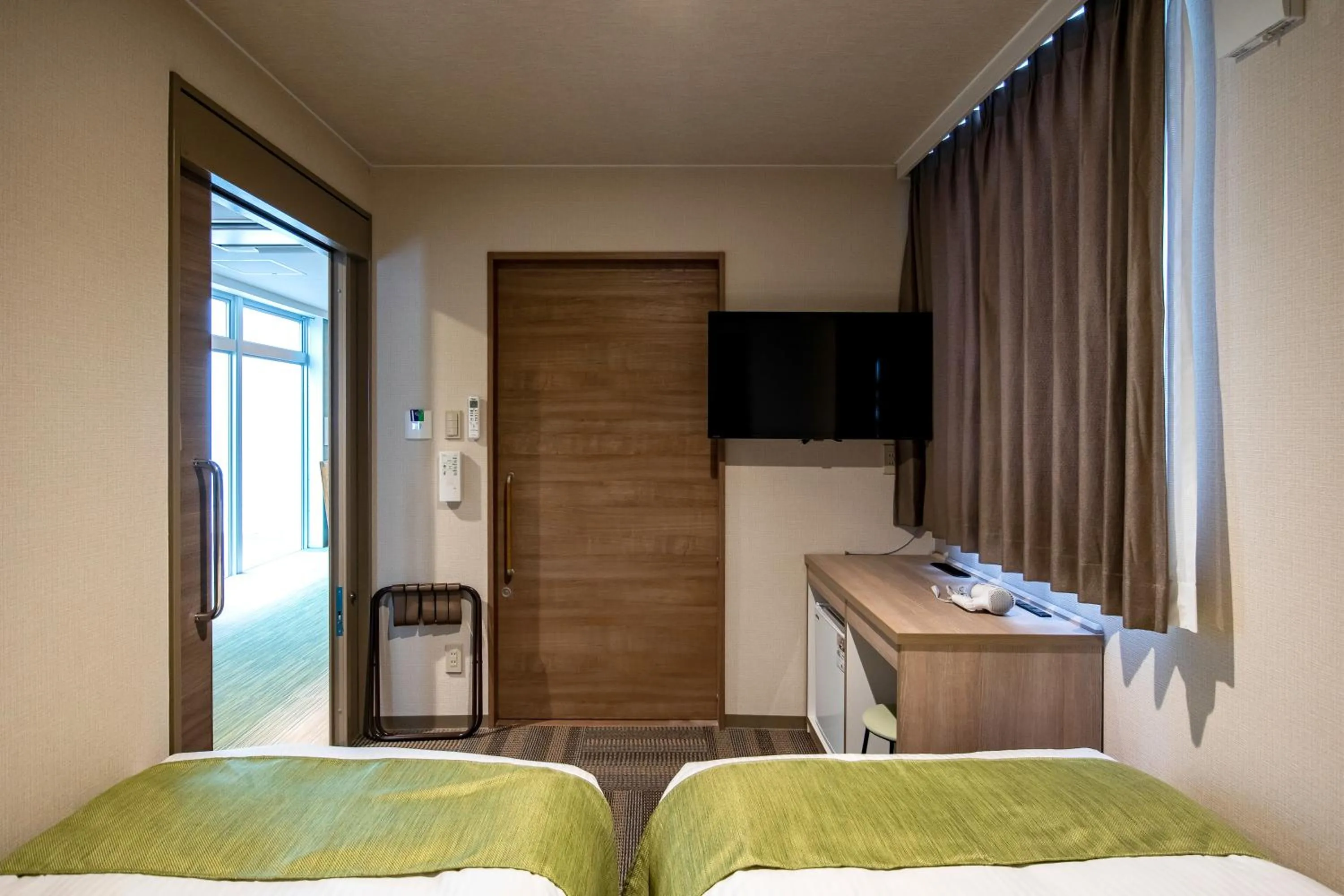 Photo of the whole room, Bed in Hotel Lantana Naha Matsuyama