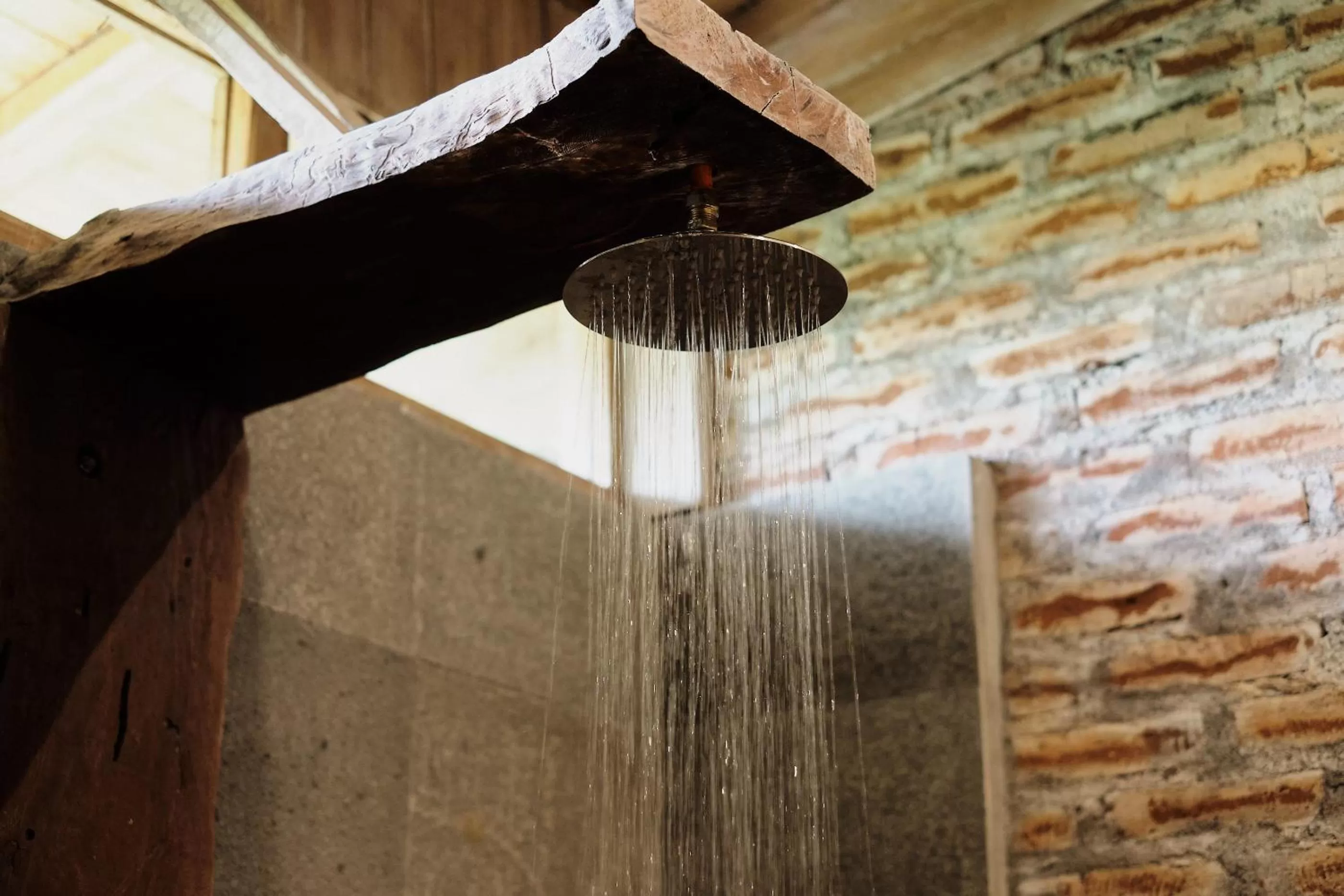 Shower in Joglo Organik Guesthouse