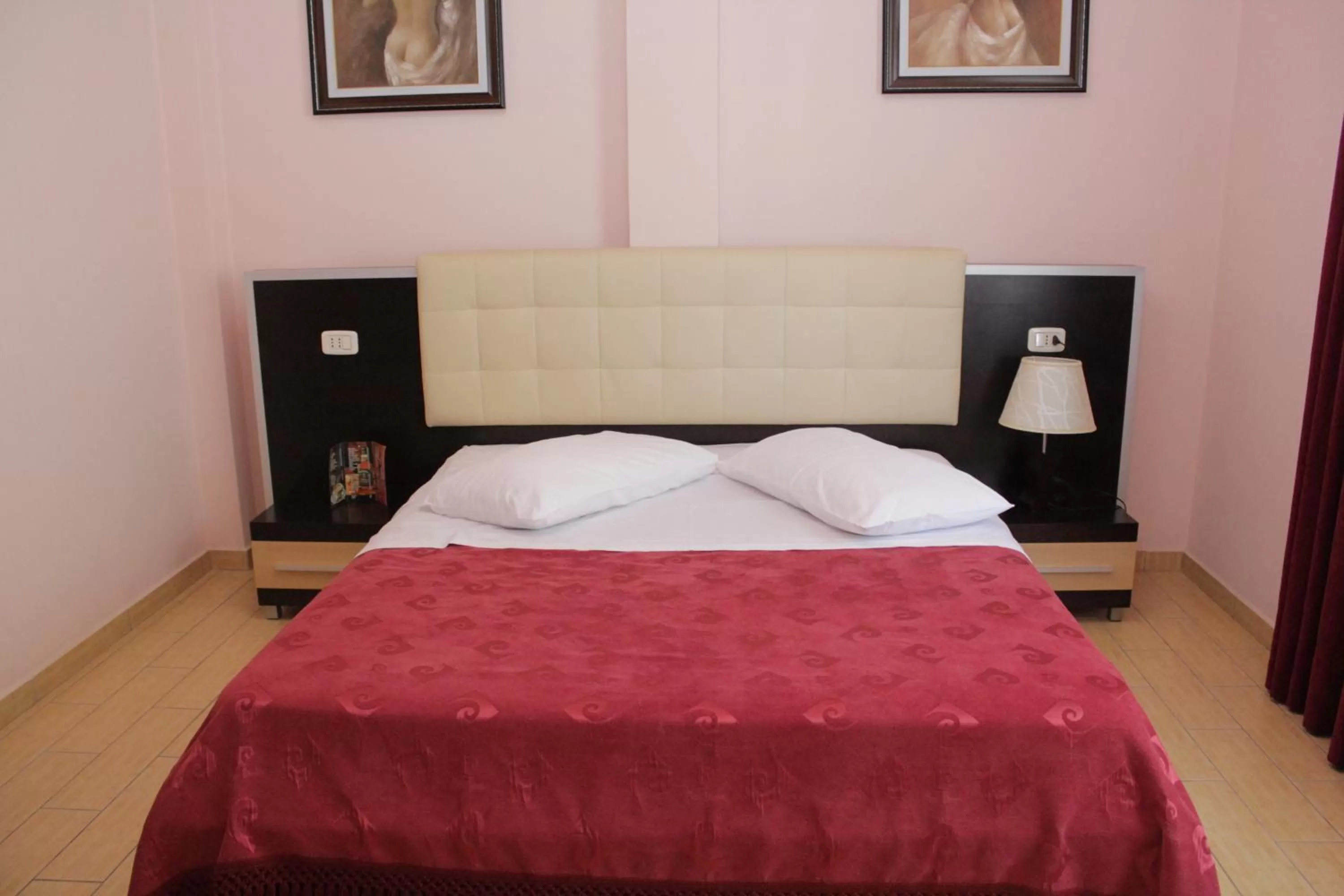 Bed in Fieri International Hotel