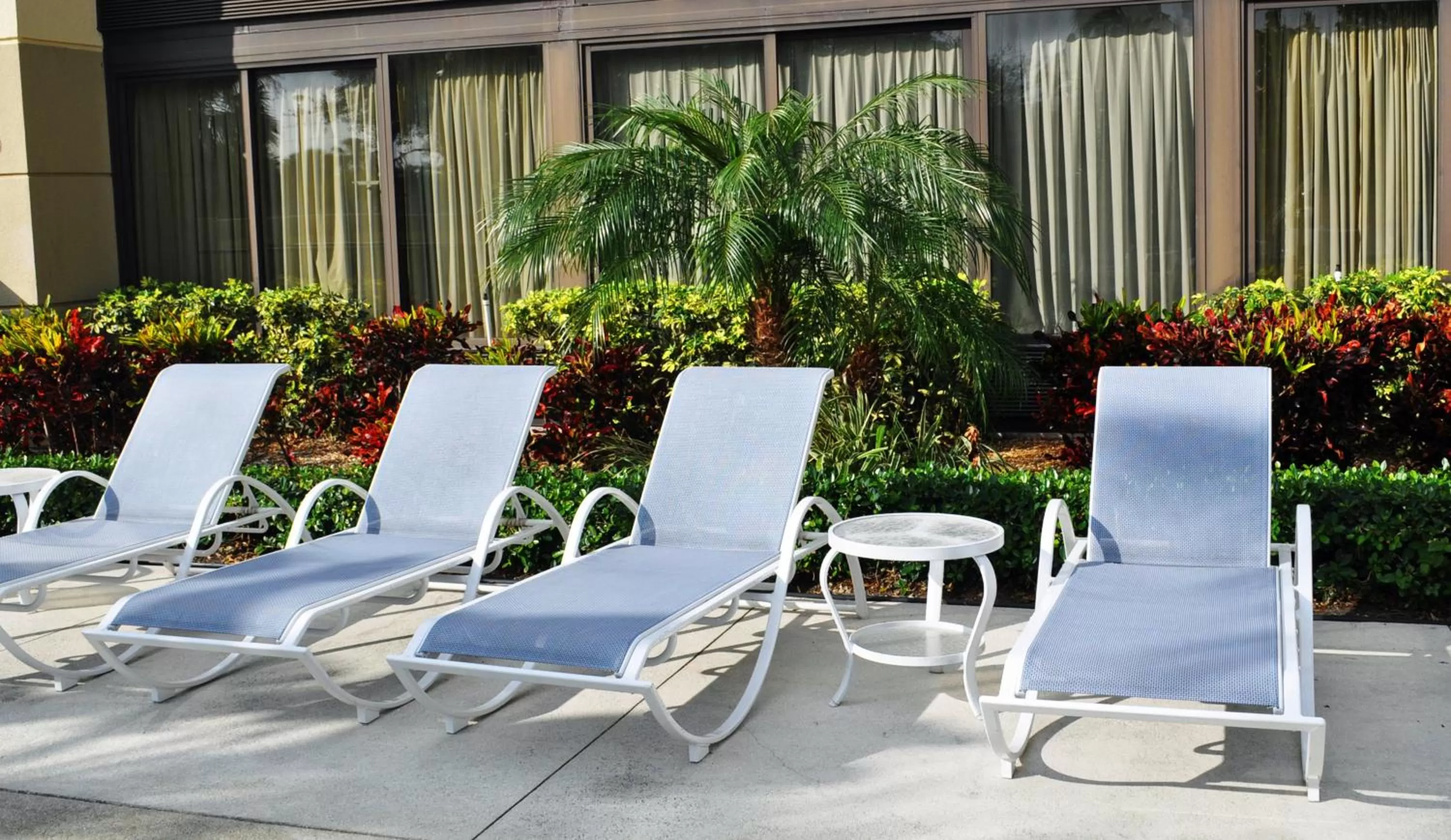 Swimming pool in Holiday Inn Express Boca Raton - West by IHG