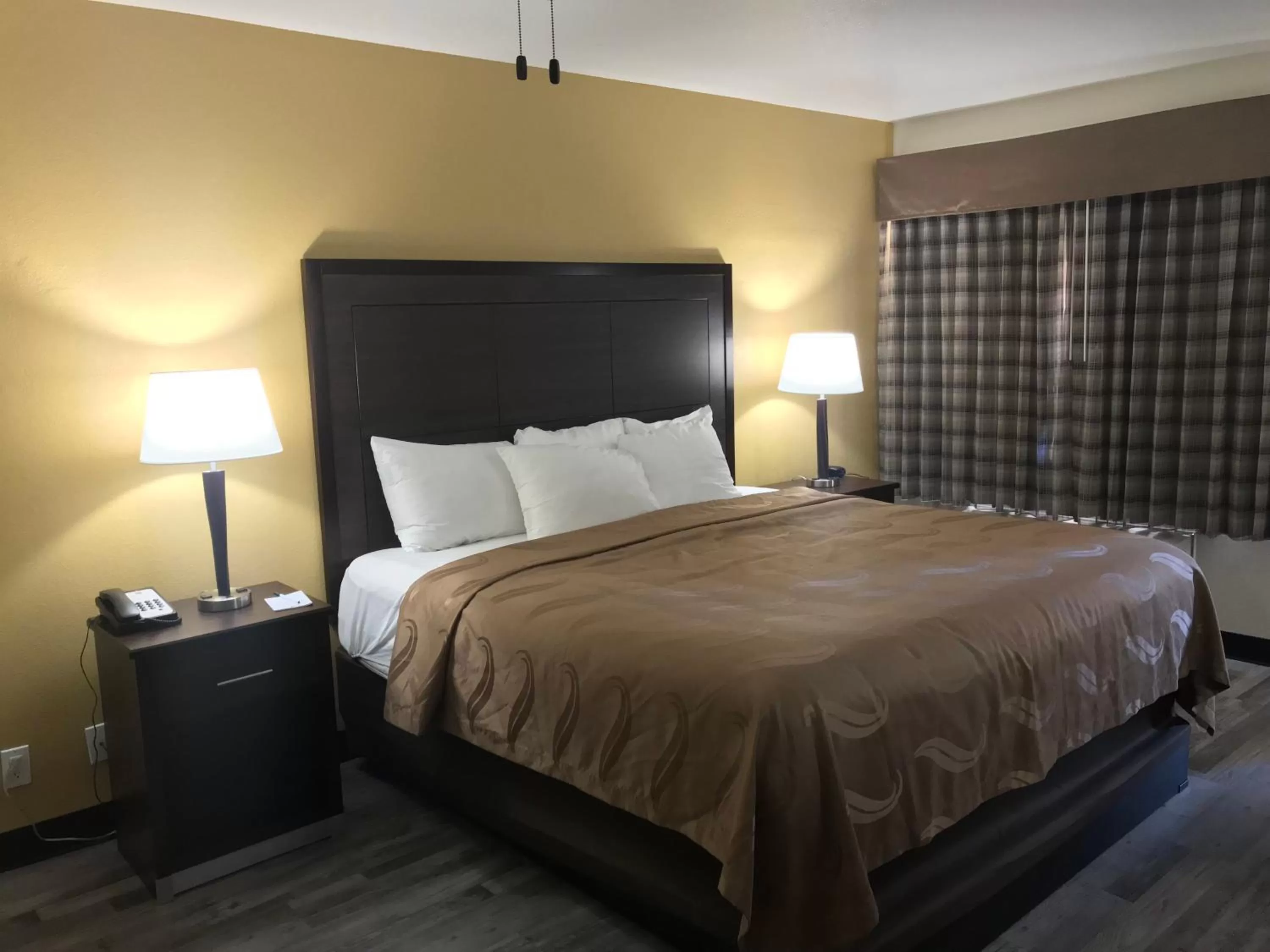 Bedroom in Quality Inn & Suites near Downtown Mesa