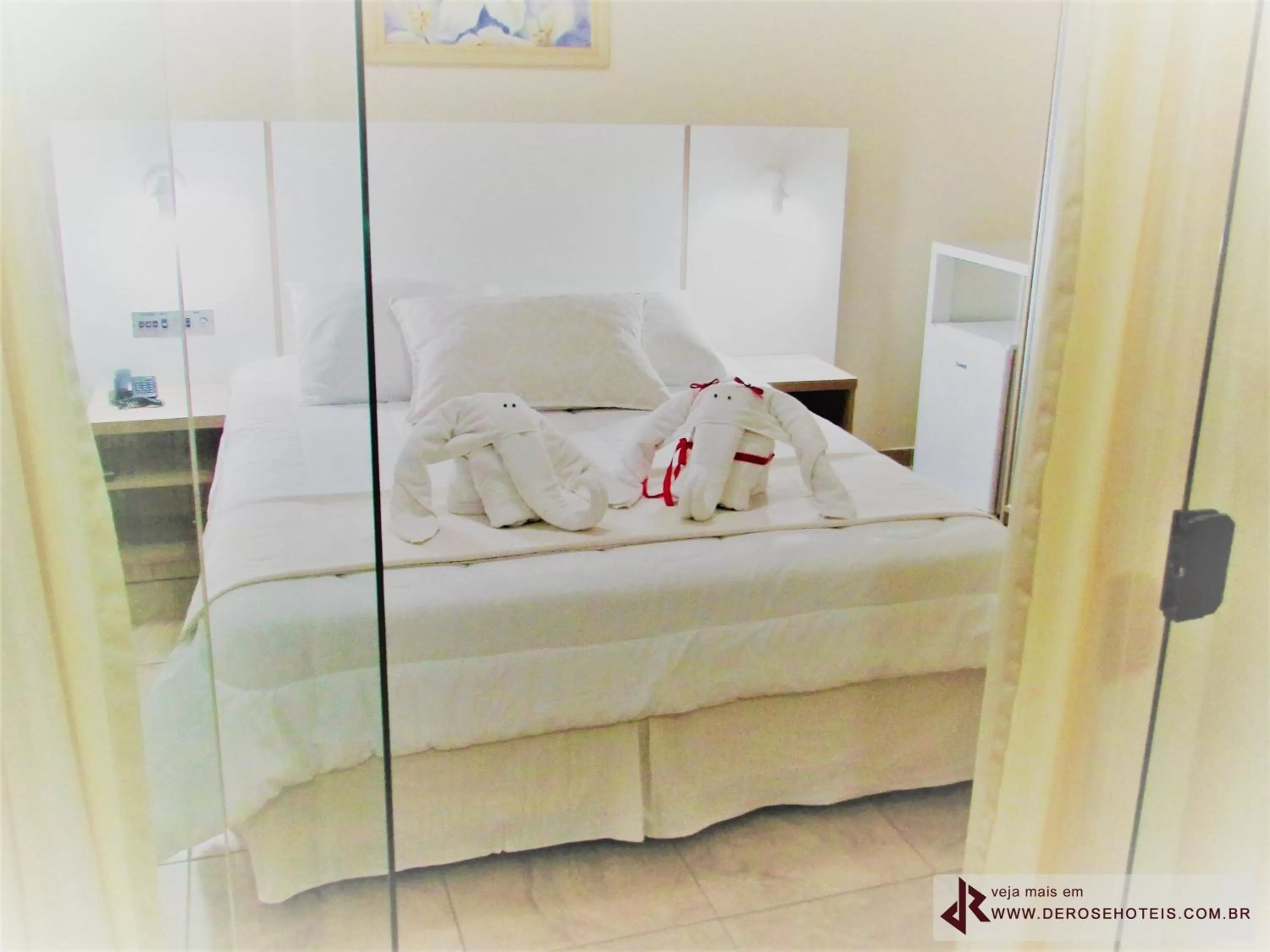 Bed in De Rose Palace Hotel