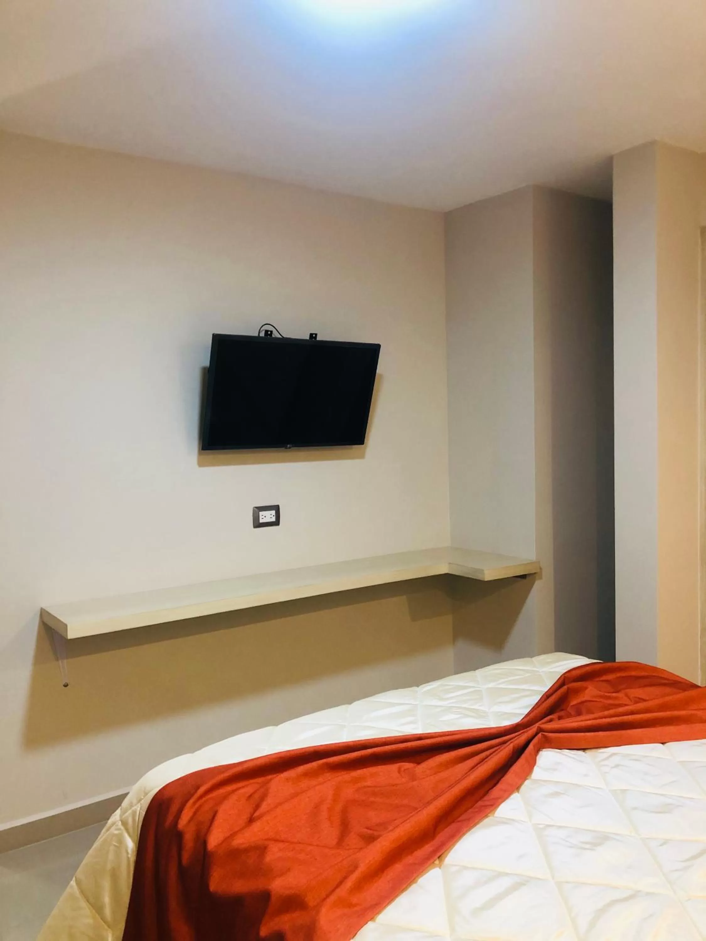 Bedroom in Suites San Luis