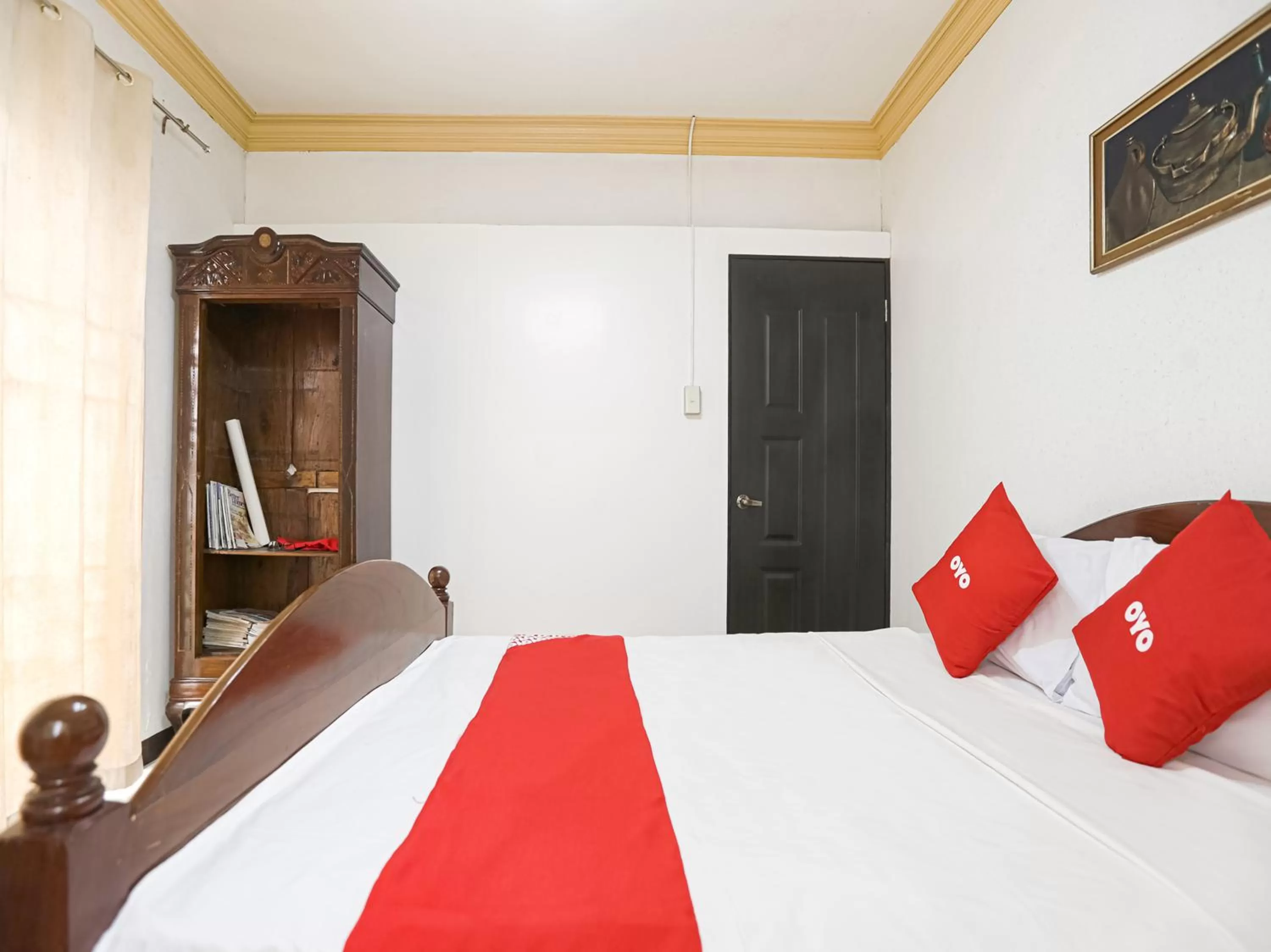 Bedroom, Bed in OYO 784 Laura's Garden Resort